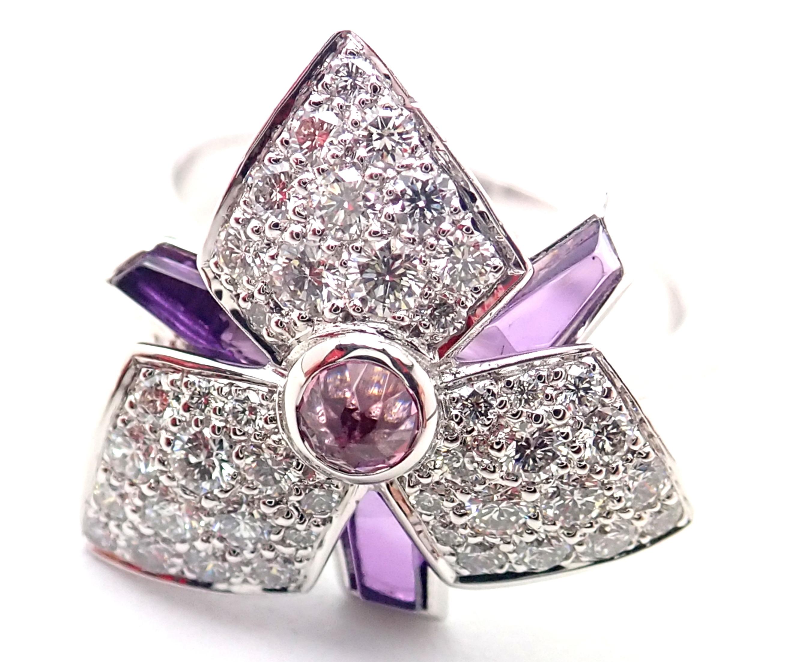 18k White Gold Diamond Amethyst Caresse D'orchidées Orchid Flower Ring by Cartier.
With Round brilliant cut diamonds VS1 clarity, E color total weight approx. .52ct
Amethysts
Details:
Size: European 49, US 4 3/4
Weight: 6.1 grams
Width: 