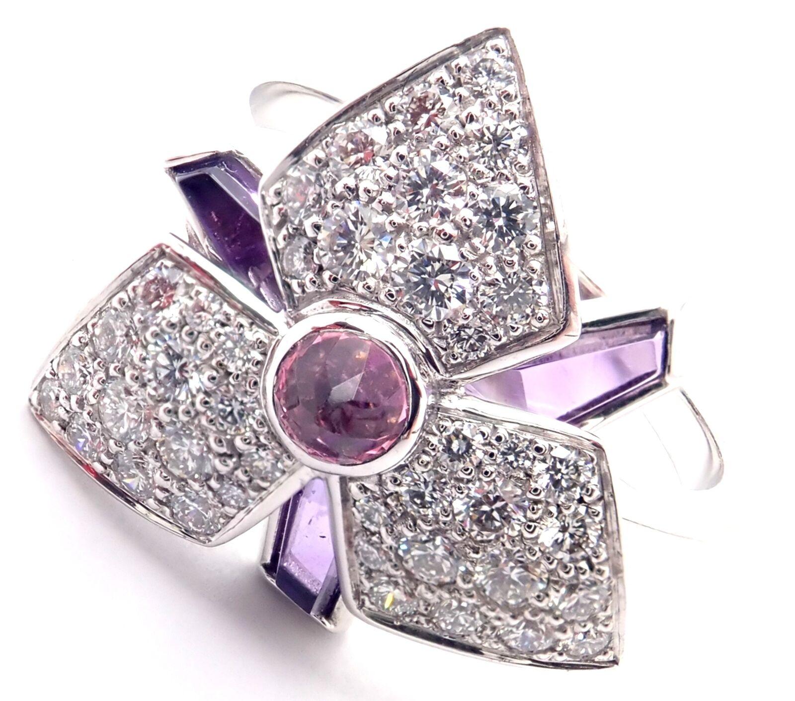 18k White Gold Diamond Amethyst Caresse D'orchidées Orchid Flower Ring by Cartier.
With Round brilliant cut diamonds VS1 clarity, E color total weight approx. .52ct
Amethysts
Details:
Size: European 55, US 7 1/4
Weight: 6.6 grams
Width: 