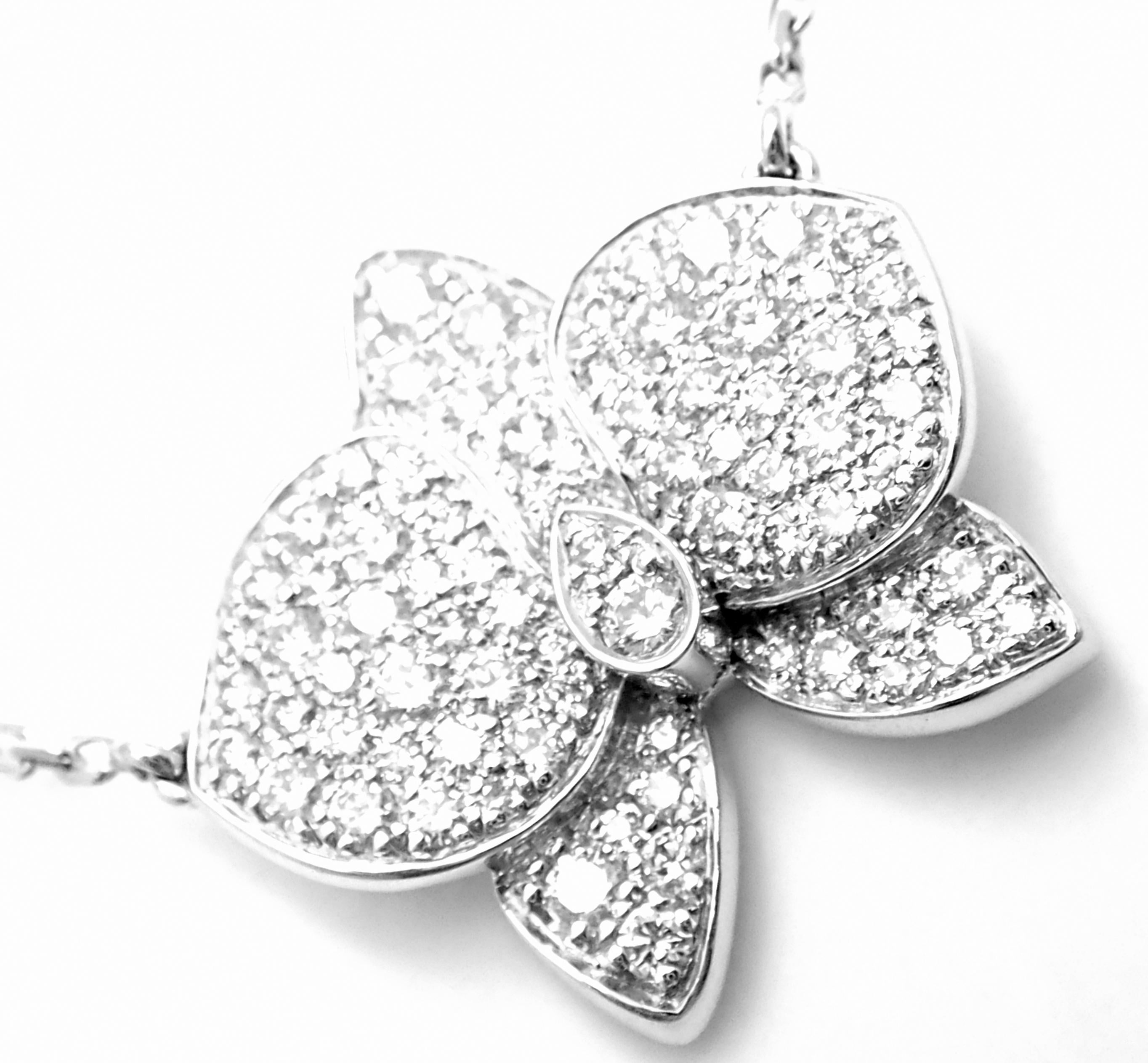 18k White Gold Caresse D'orchidées Orchid Flower Diamond Pendant Necklace by Cartier.
With 75 round brilliant cut diamonds VS1 clarity, E color total weight approx. 1.25ct
This necklace comes with original Cartier box and Cartier certificate.
This