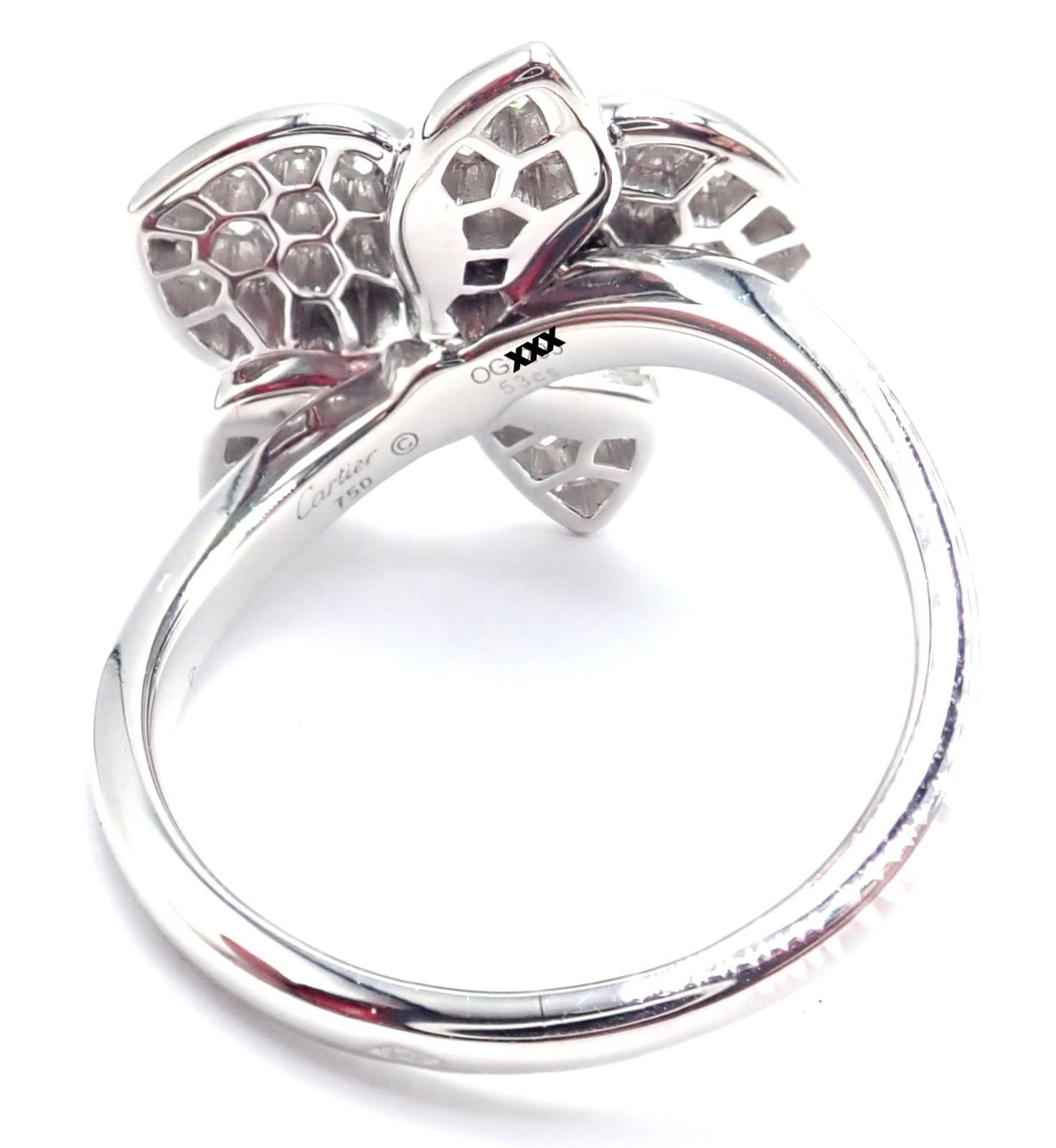 18k White Gold Caresse D'orchidées Orchid Flower Diamond Ring by Cartier.   
With 49 round brilliant cut diamonds VS1 clarity, E color total weight approx. .54ct
This ring comes with service paper from Cartier store in NYC and a Cartier