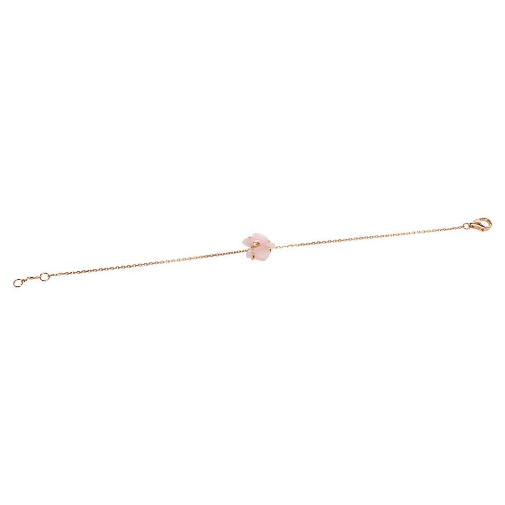 Cartier lovers will instantly recognize this Caresse D'orchidees Par bracelet featuring the delicate orchid flower rendered in pink Chalcedony, as this popular flower is one of the classic motifs of the label's jewelry. An embodiment of feminine