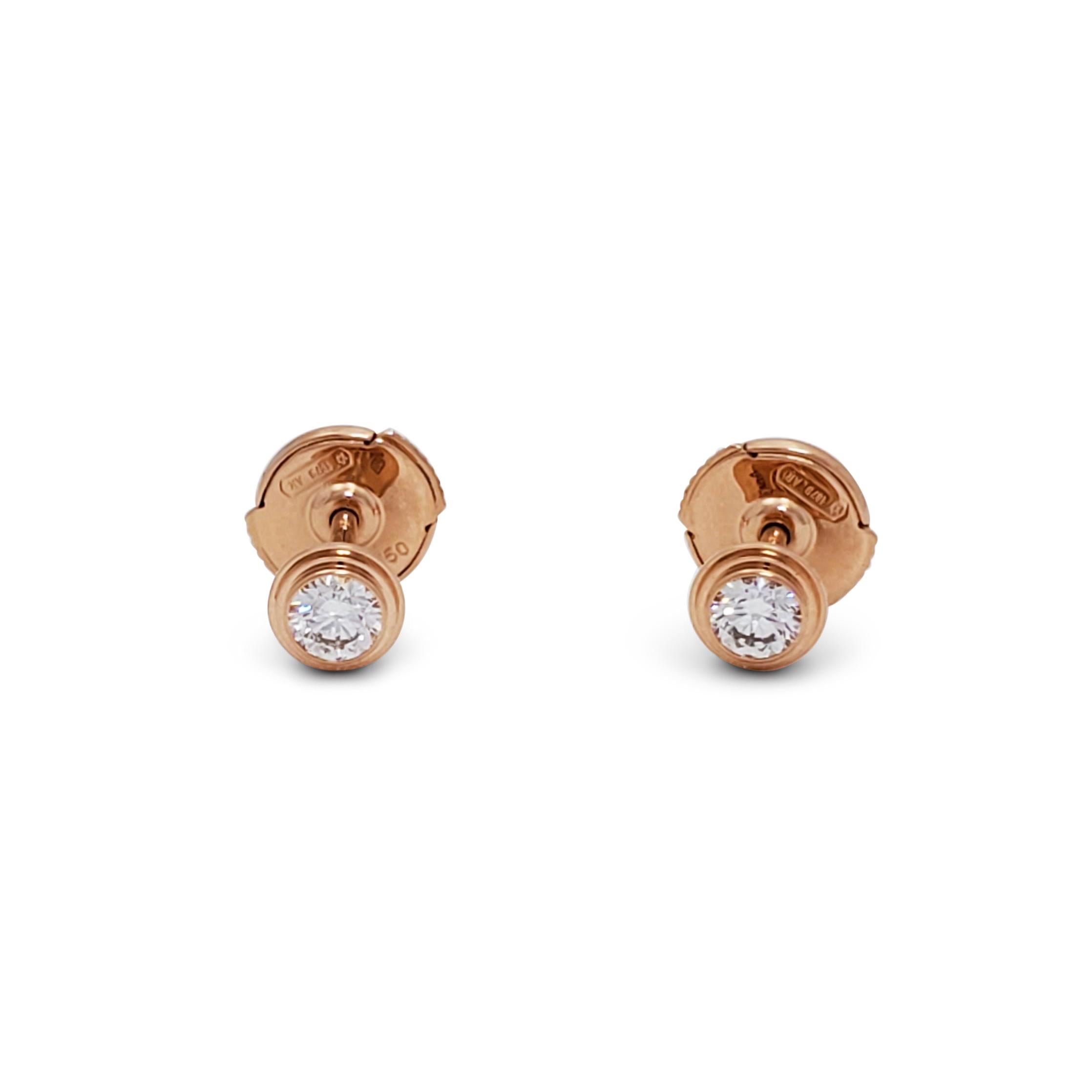 Authentic Cartier d'Amour earrings crafted in rose gold.  Each stud earring features a single round brilliant cut diamond at the center for an estimated 0.18 carats total weight.  Earrings measure 4.5mm in diameter with posts for pierced ears. 