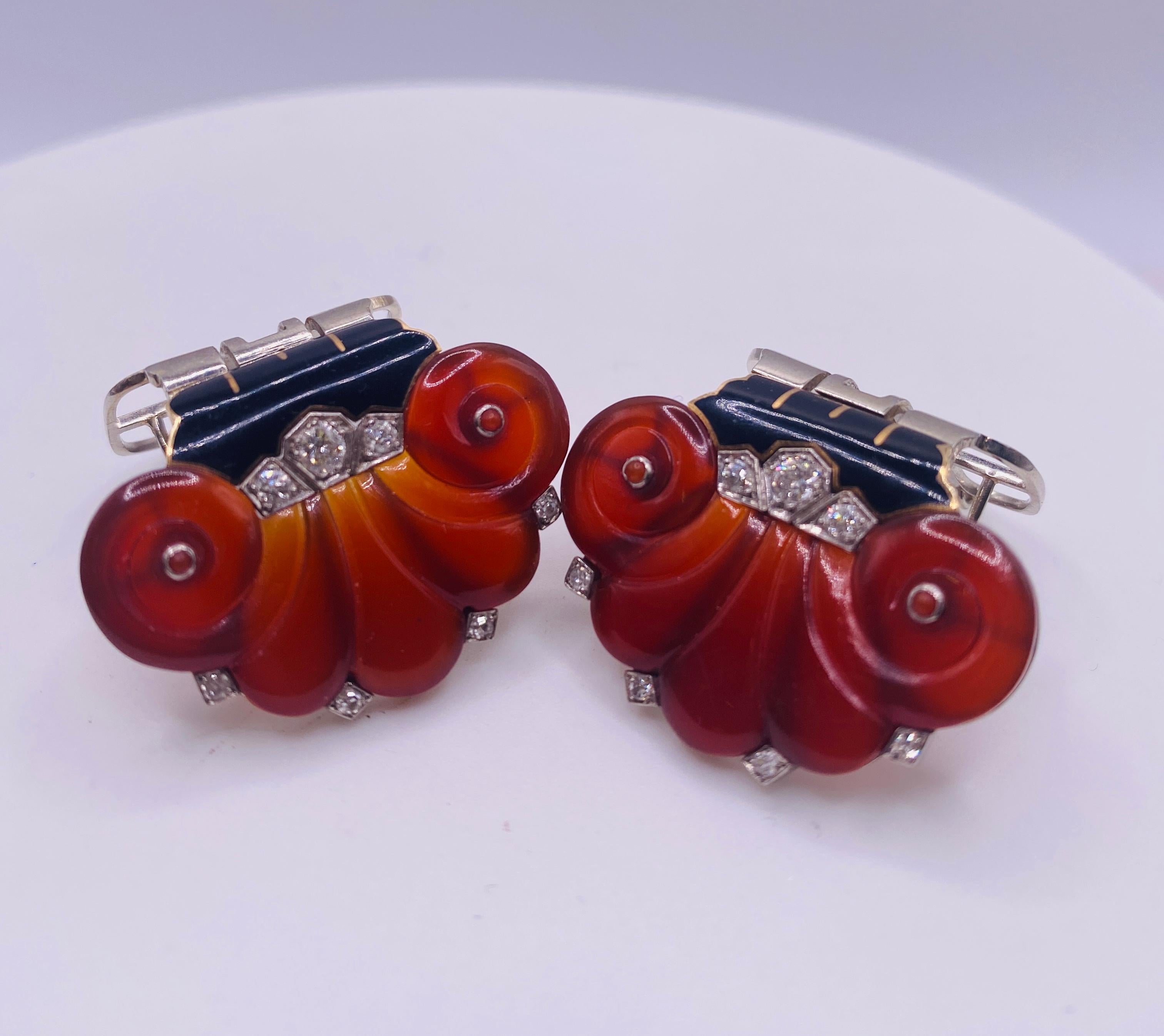 Cartier New York carved carnelian diamond cabochon coral clip brooch circa 1940's. Clearly marked CARTIER on both clips.  7.1Dwt