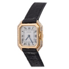 Montre-bracelet Cartier Ceinture pour femme en or jaune et diamants