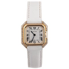 Montre-bracelet Cartier Ceinture pour femme en or jaune et diamants