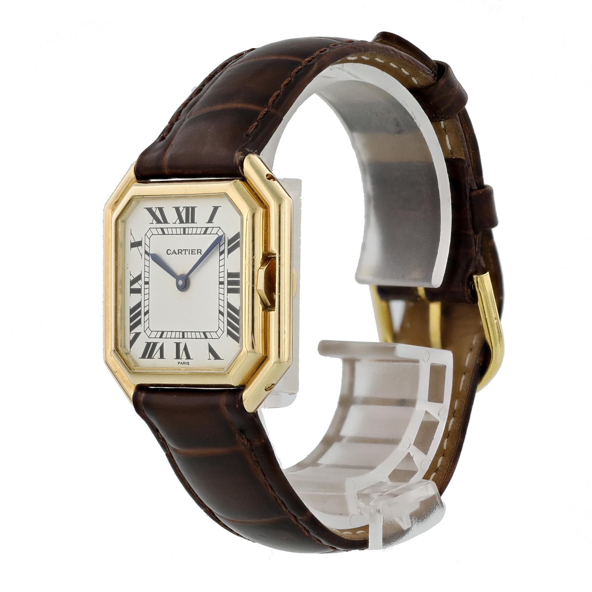 Cartier Ceinture Paris Automatic Ladies Watch. 
30mm 18k Yellow Gold case. 
Yellow Gold bezel. 
White dial with Blue steel hands and roman numeral hour markers. 
Minute markers on the outer dial. 
Alligator grain strap with Buckle. 
Will fit up to a