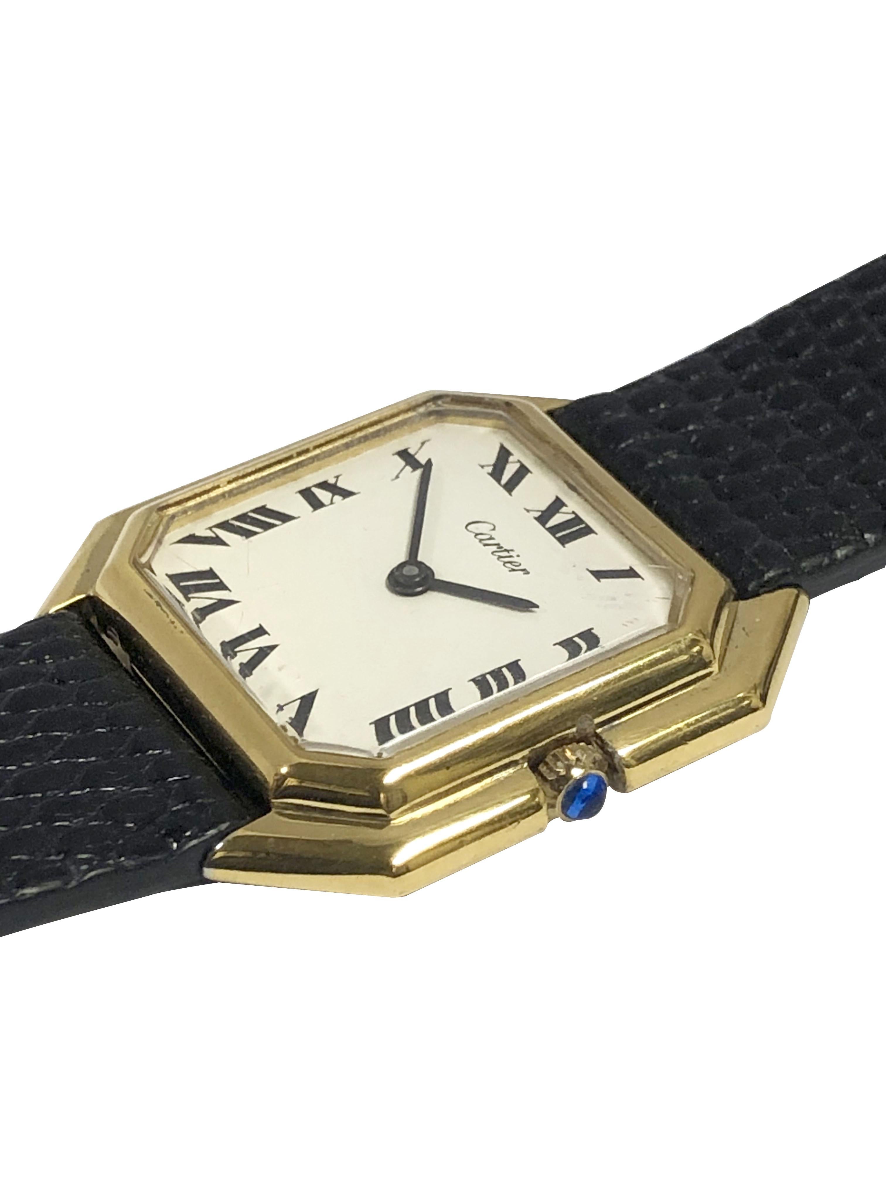 Circa early 1970s Cartier Centure Wrist watch, 33 x 30 2 piece Gold Pate Stepped case. Sapphire set Crown, Acrylic Crystal, Cartier Inc. 17 jewel Mechanical, manual wind movement. New Black Lizard strap, wrist size 8 1/4 inches. Recently serviced by