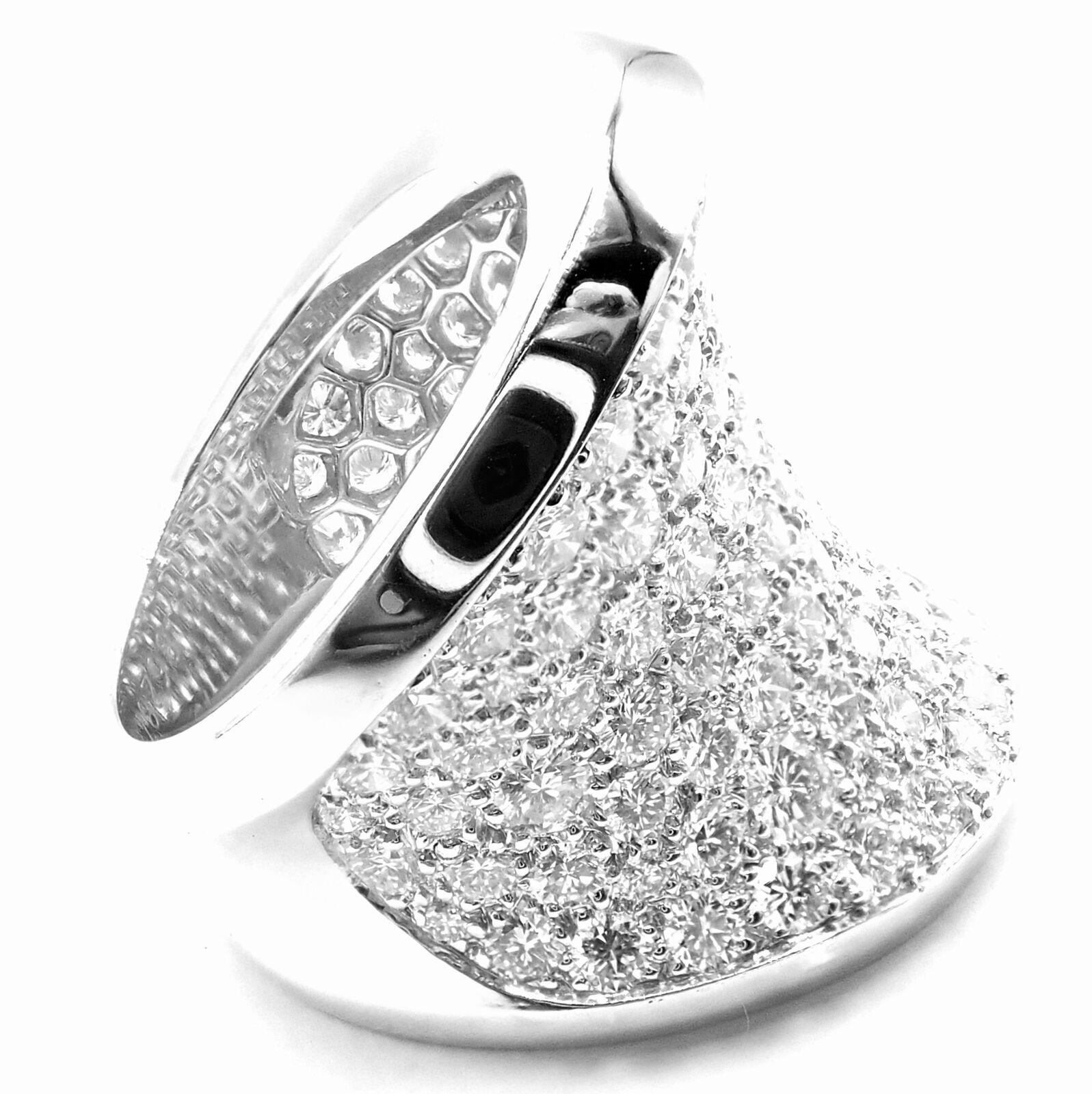 18k White Gold Chalice Diamond Large Ring by Cartier.
With 127 Round Brilliant cut, total weight 6.60ct E color VVS1 clarity
This absolutely gorgeous ring comes with a Cartier service paper and a Cartier box.
Details:
Ring Size: European 62 US