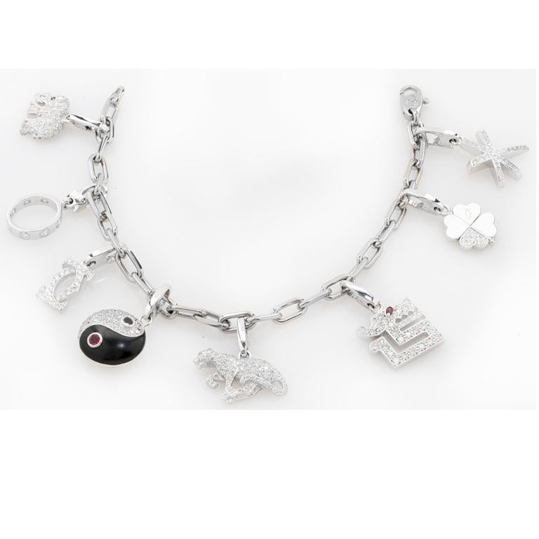Cartier Charm Bracelet, a stunning piece of jewelry that is sure to capture your heart. Crafted from 18kt white gold, this exquisite bracelet features eight dazzling charms that are set with shimmering diamonds, adding a touch of elegance and