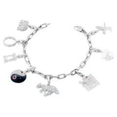 Retro Cartier Charm Bracelet in 18 Karat White Gold With 8 Charms