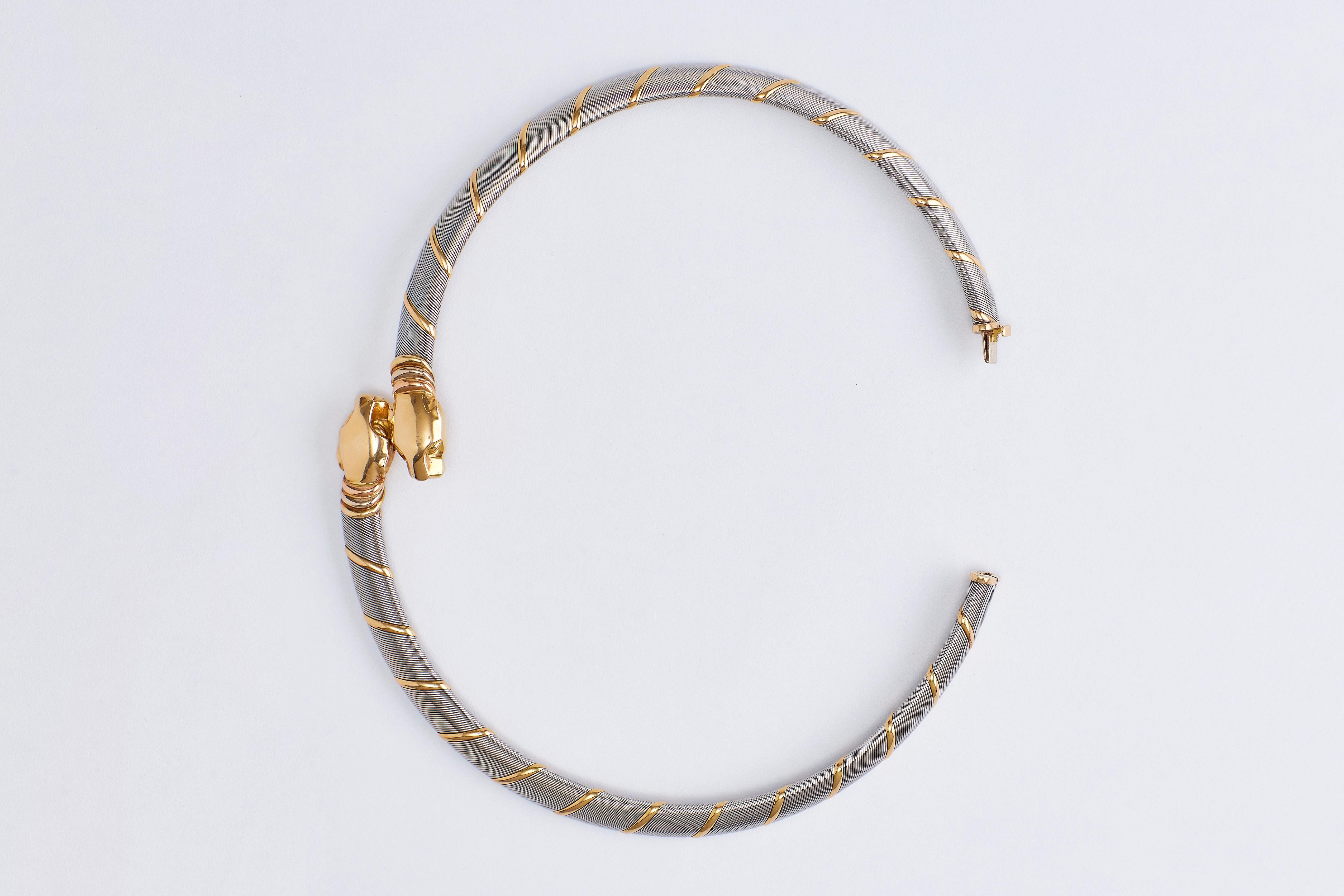Cartier Choker (collar) 18 Karat Gold Double Headed Panther Necklace.
Authentic magnificent Cartier white and yellow gold necklace with double panthere head. 
Signed no. 996241.
Total weight: 73 grams.
