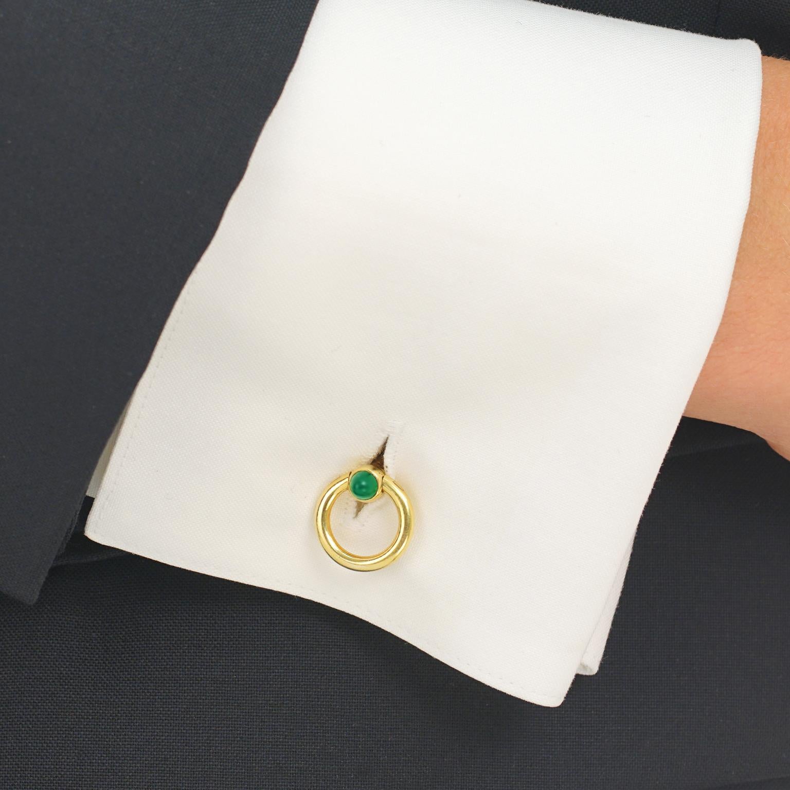 Circa 1950s, 14k, Cartier, New York. Urbane, cosmopolitan, refined, understated -- words that come to mind when I think of Cartier. These 14k yellow gold fifties cufflinks have that distinctive Cartier New York look. The Chrysoprase cabochons add a