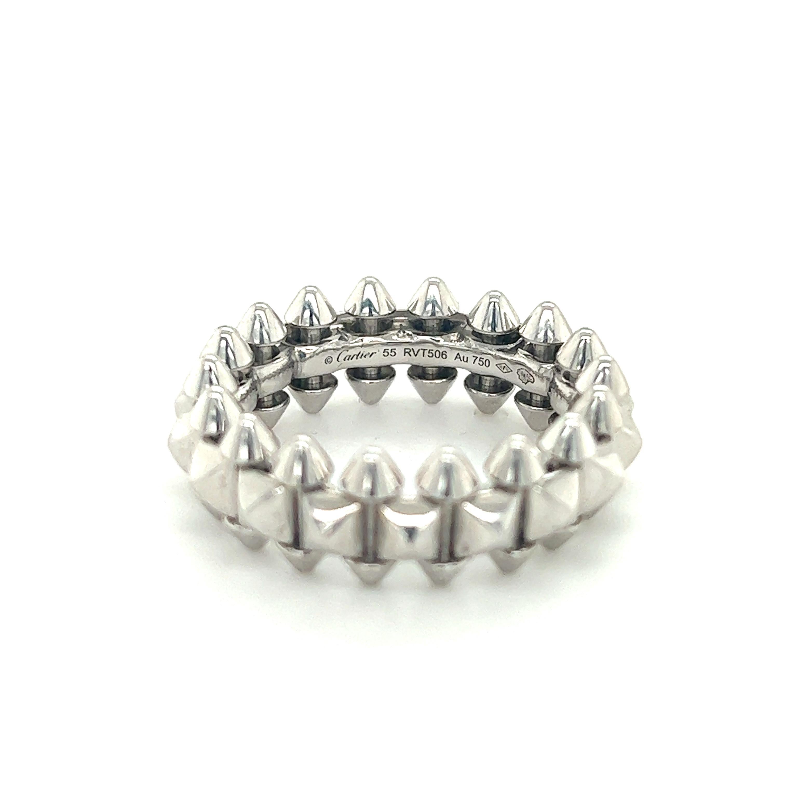 Beautiful ring from famed designer Cartier. The ring is from the Clash de Cartier collection. This model is crafted in 18k white gold with a rhodiumized finish, it is the medium model of the design showing a 8 mm width. 
The design shows spikes at