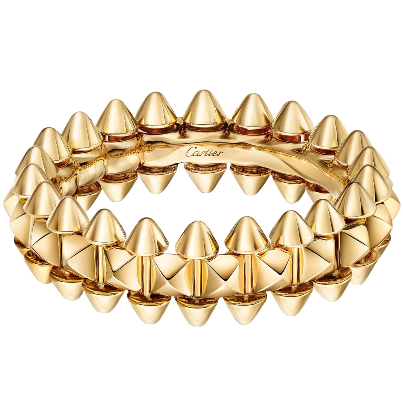 Clash de Cartier ring, small model, 18K yellow gold (750/1000). Width: 6.4 mm (for size 51). A duality of contrasts. Jewelry that simultaneously champions and rebels against classic forms, that balances a serious spirit with original