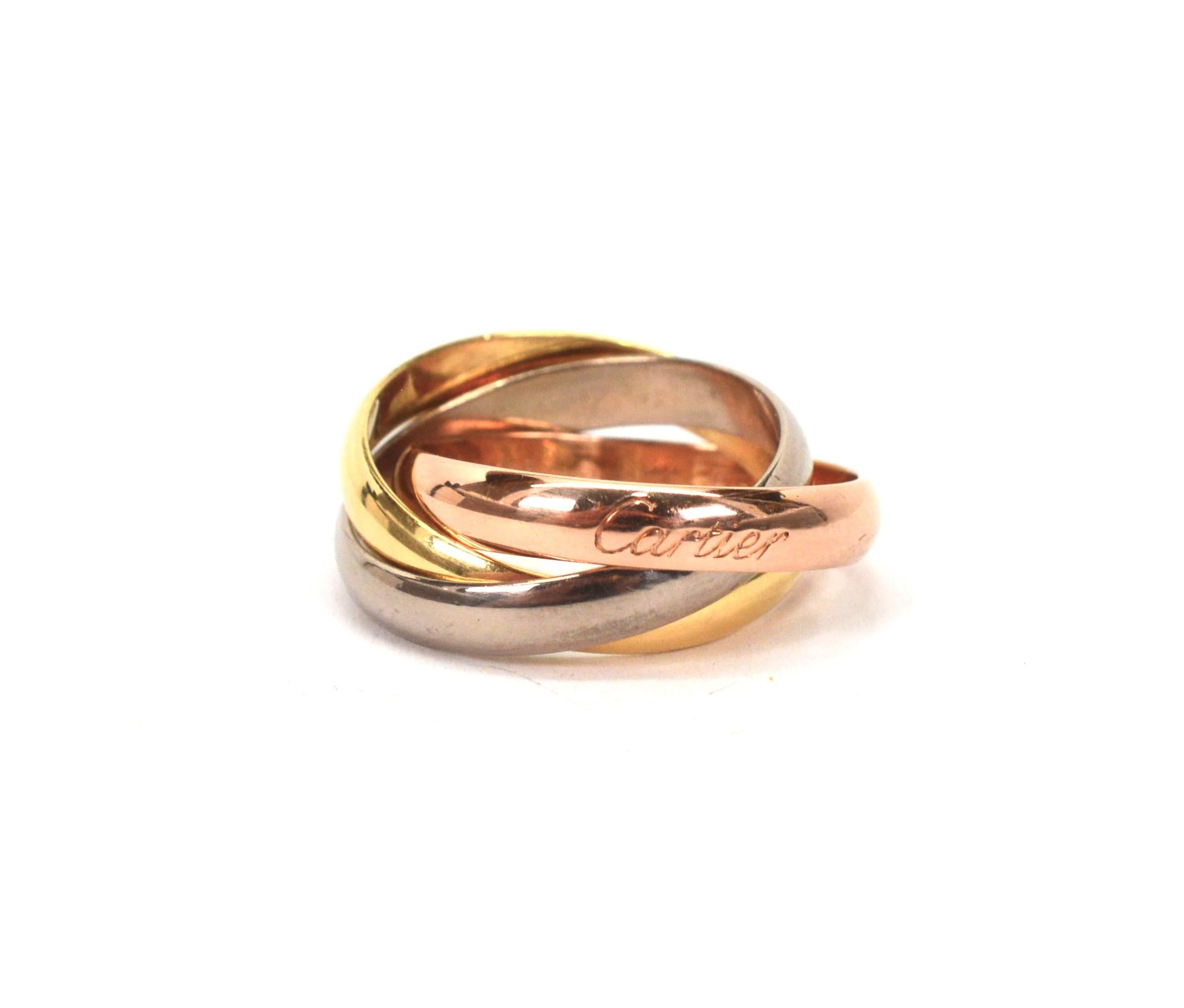 Representing all three gold hues is the classic Cartier Trinity Ring featuring intertwined bands  of 18 karat yellow gold, rose gold and white gold.  Cartier celebrates the 100th year of the Trinity design this year and simply stated, it means love,