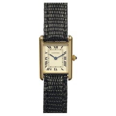 Cartier Montre-bracelet classique Tank à quartz en or jaune pour femmes