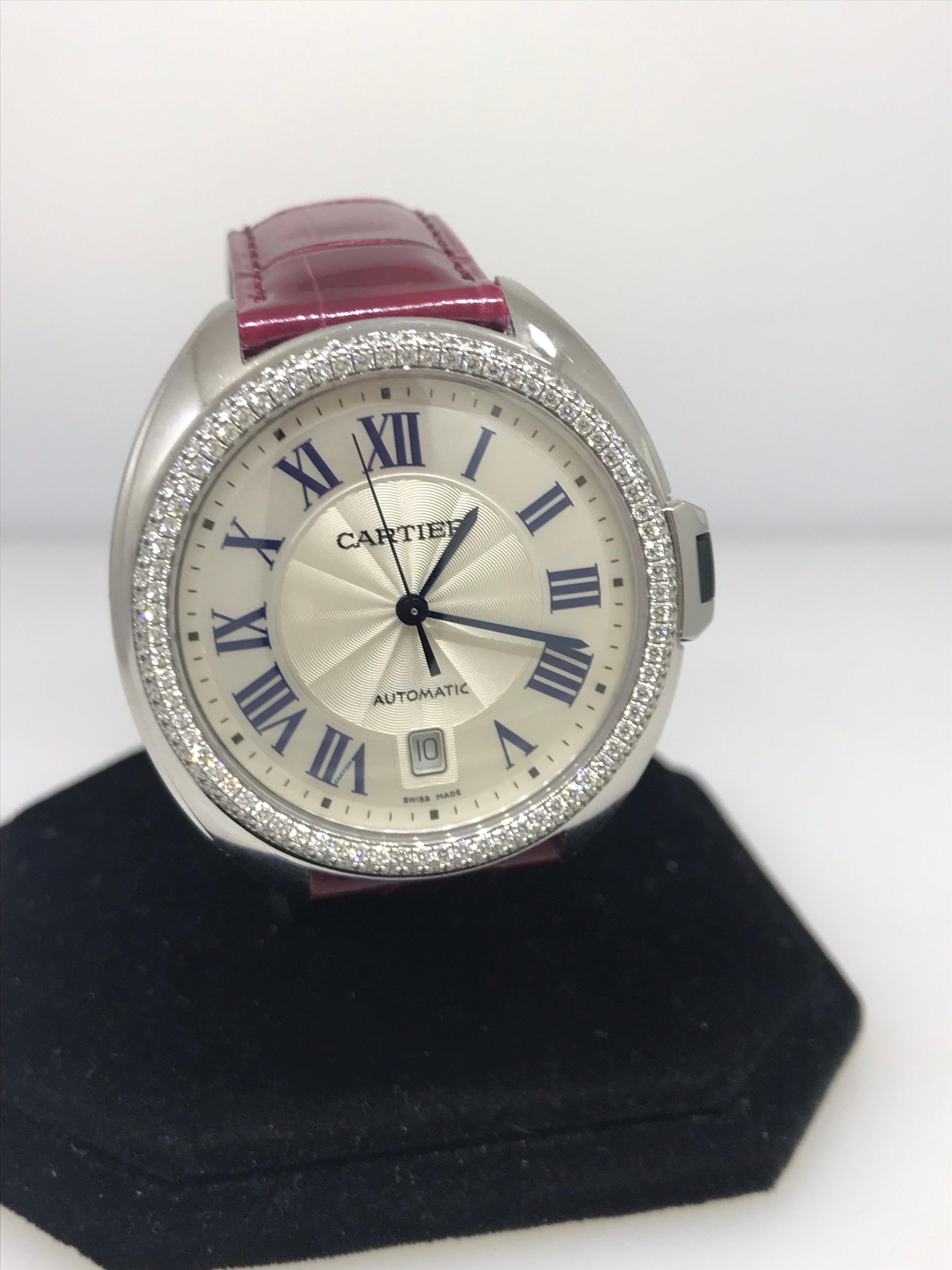Cartier Cle Ladies Watch

Model Number: WJCL0011

100% Authentic

Brand New

Comes with original Cartier Box and Papers

18 Karat White Gold Case & Buckle

Two Row Diamond Bezel

Silver Dial

Case Diameter: 40mm

Swiss made Automatic