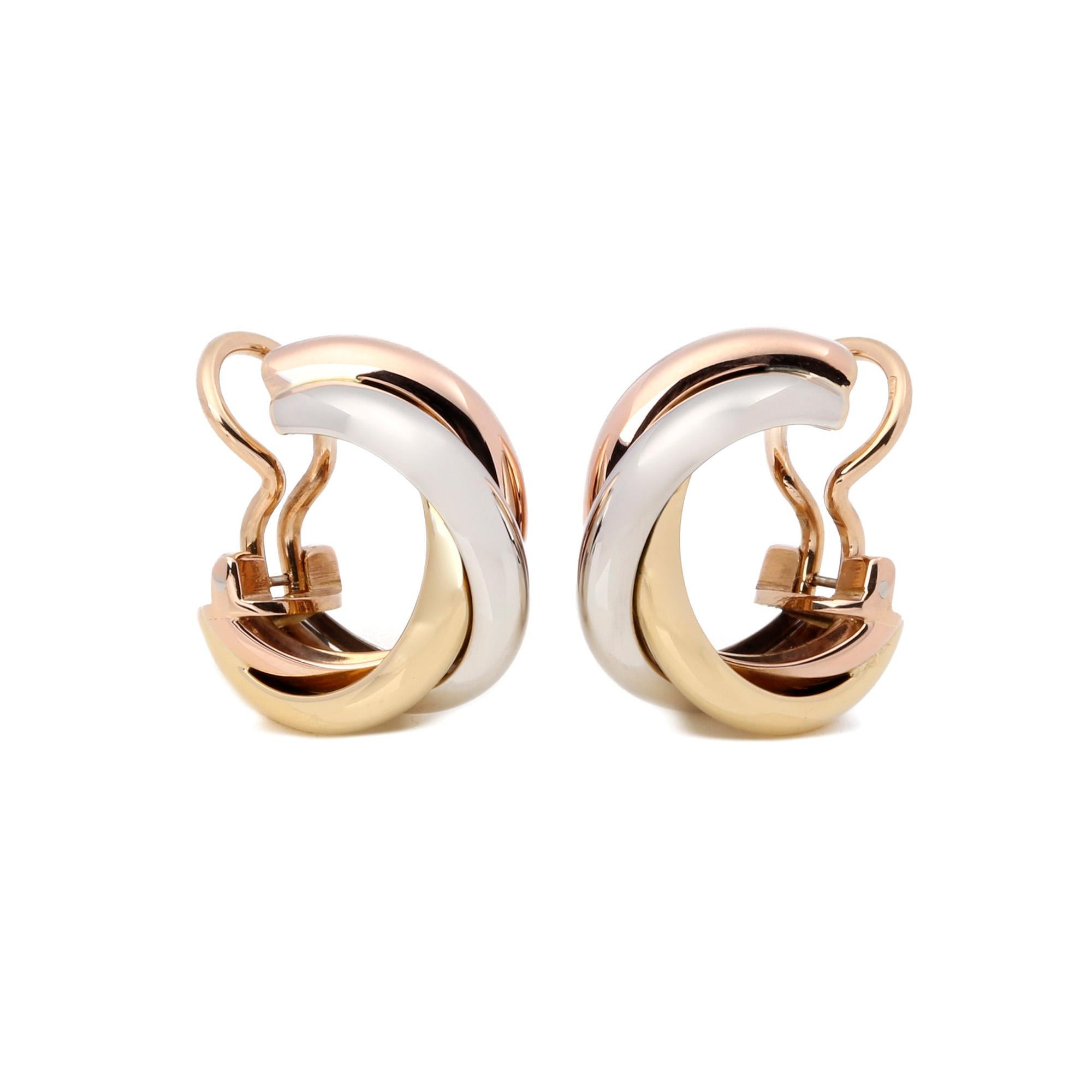 These earrings by Cartier are from their Trinity collection and feature a twisted design in tri colour 18ct gold with a clip on back. Complete with a Cartier box. Our Xupes reference is COMJ590 should you need to quote this. 