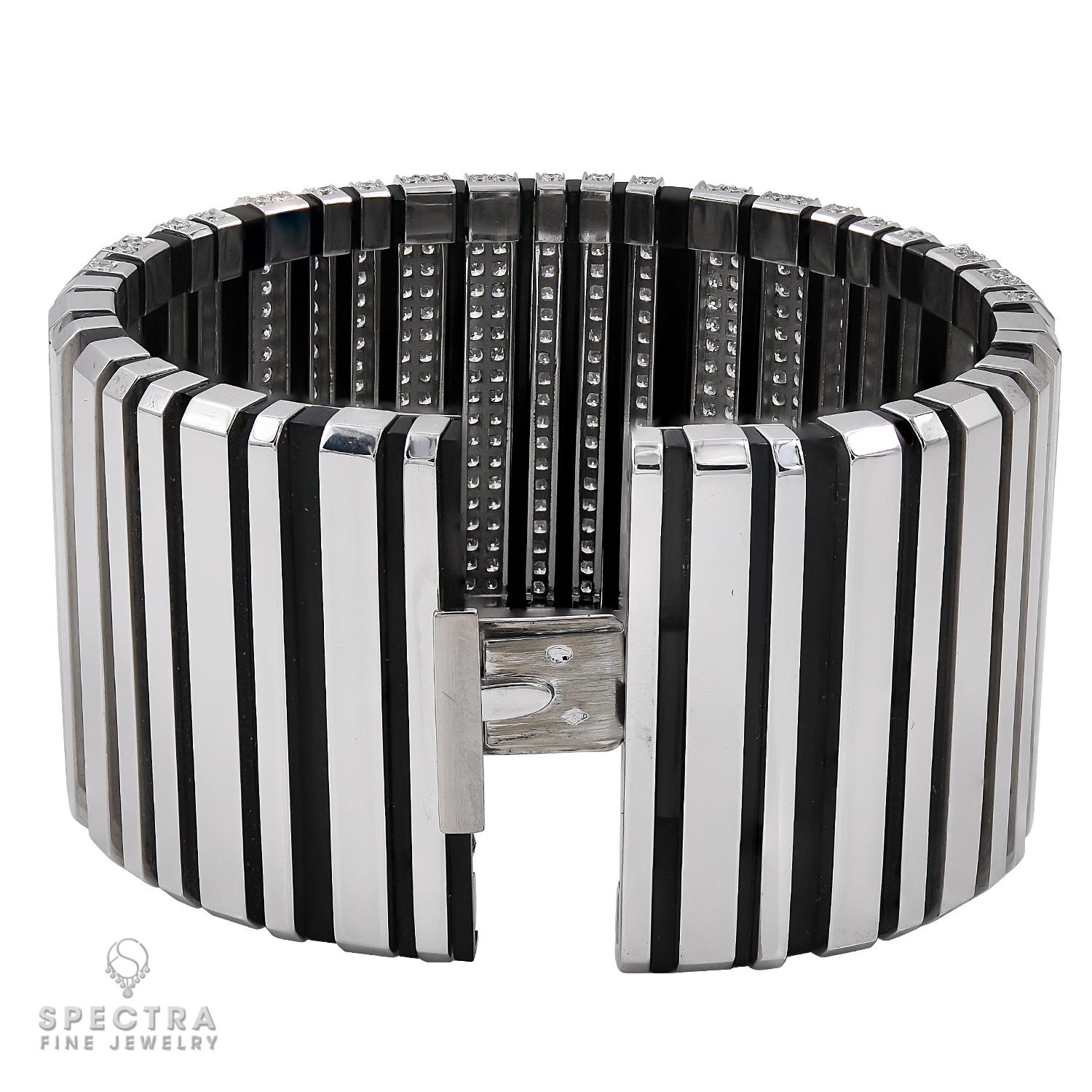 This spectacularly chic Cartier Code Barre Pierre Brun Bracelet, made in France in the 20th century, circa 1990s, features the sleek geometry, crisp lines, and high contrast color combinations that have continued to fascinate the world-renowned