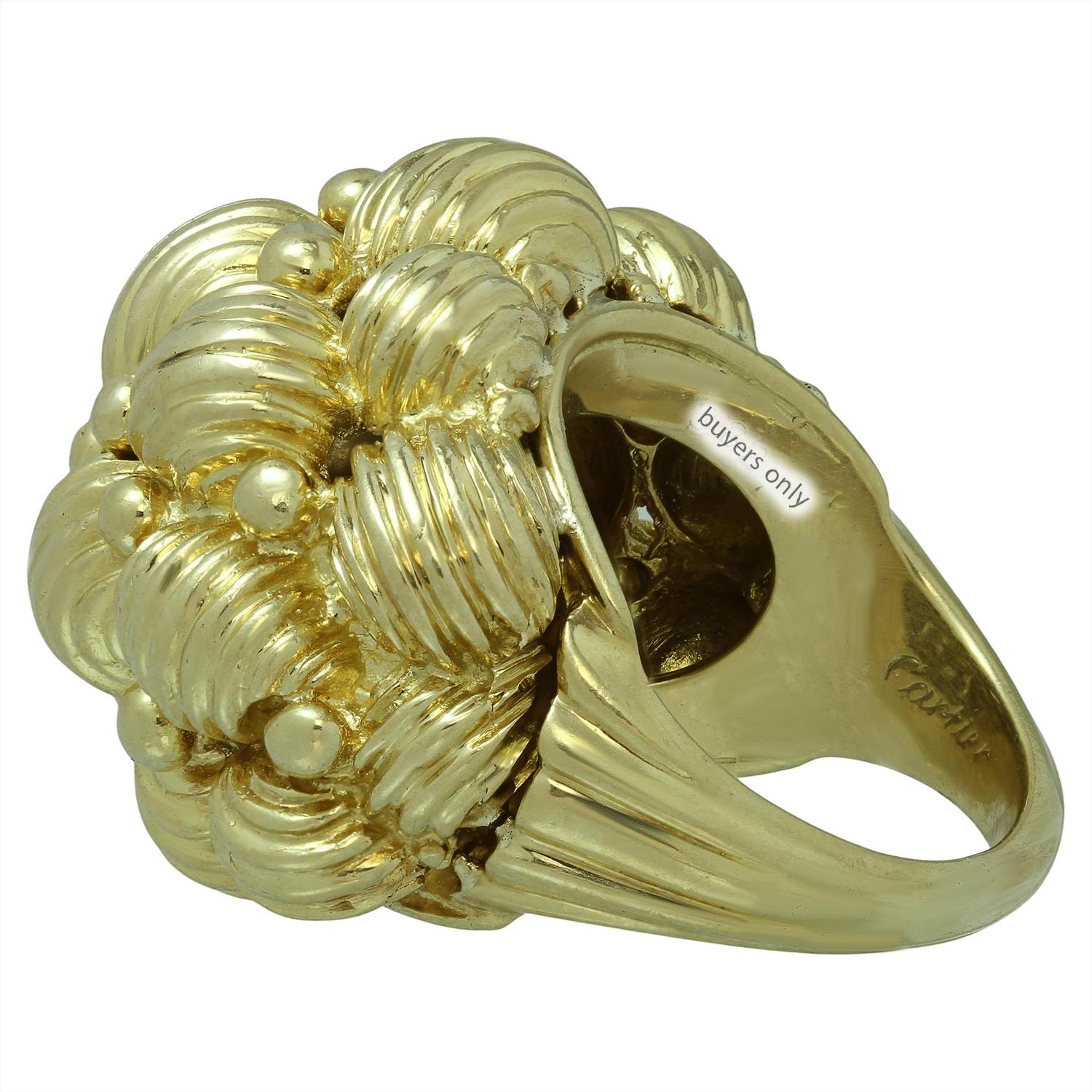 This gorgeous rare vintage Cartier ring is crafted in 18k yellow gold from a 