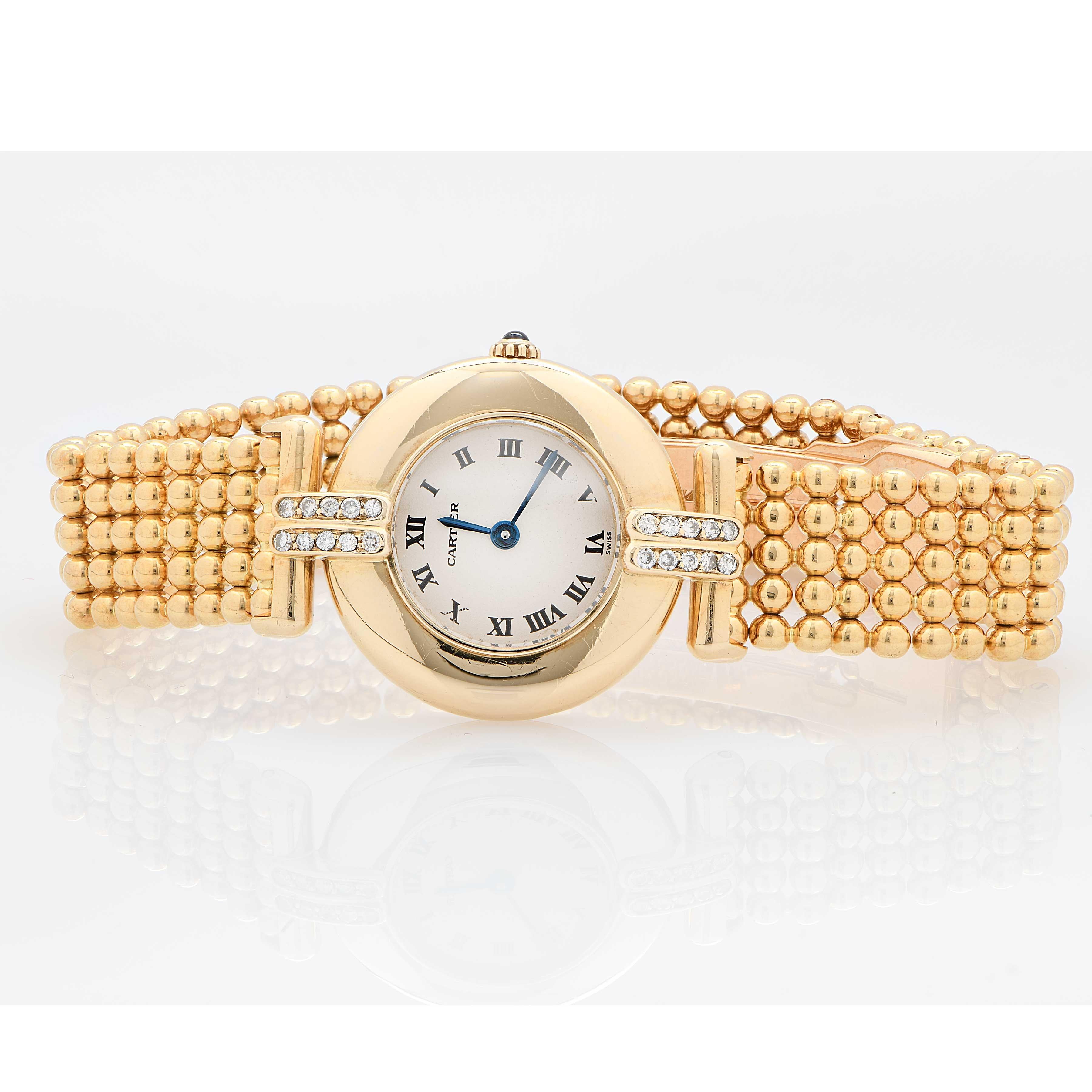 Cartier Colisee Watch with aftermarket diamond on case. 20 diamonds with an estimated total weight of .20 carat in 18 Karat Yellow Gold.
This watch carries a one year warranty from us and has been serviced by our expert watchmaker. 
Case size: