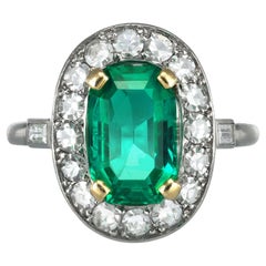 Cartier Colombian emerald and diamond cluster ring, French.