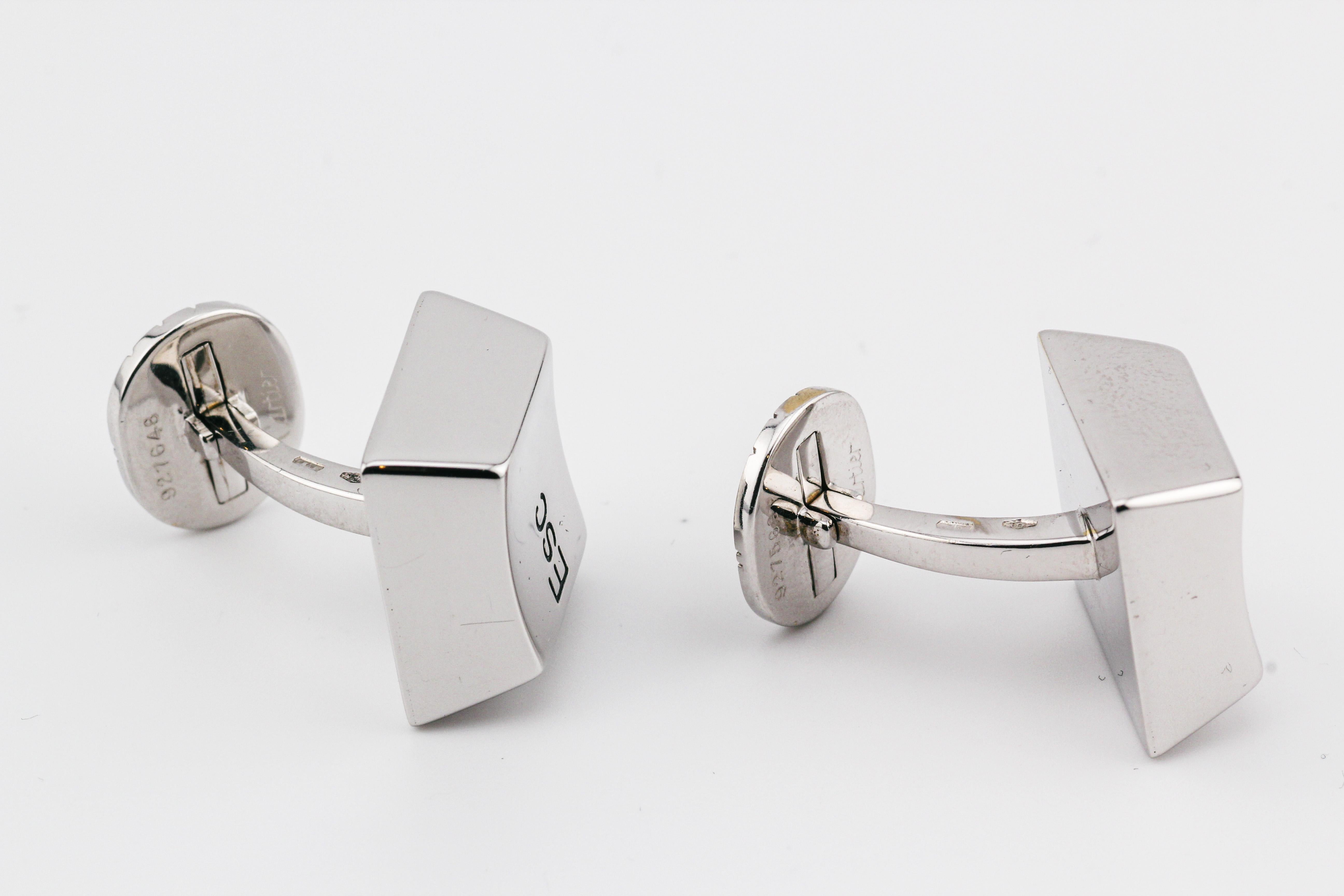 Immerse yourself in the fusion of technology and luxury with the Cartier Computer Keys Ctrl Esc 18k White Gold Cufflinks. These distinctive cufflinks, created by the prestigious French jeweler Cartier, seamlessly blend functionality with opulence,