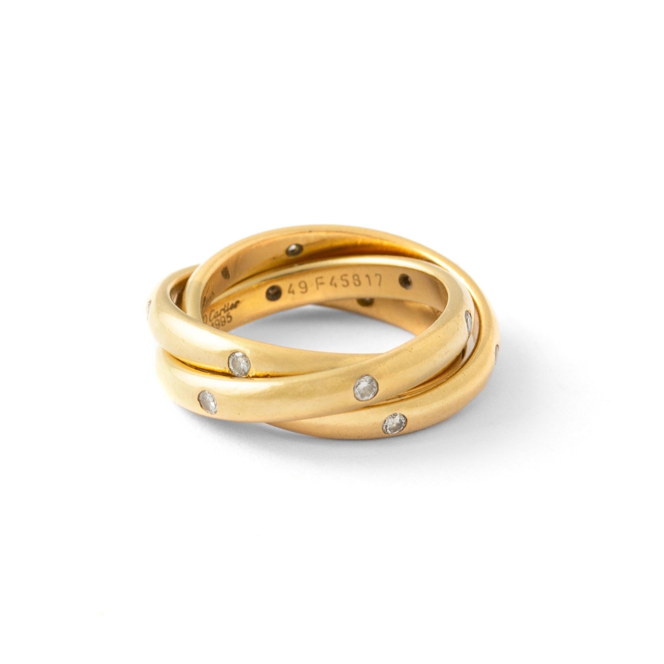 Cartier Constellation Diamond Yellow Gold Trinity Band Ring

This fabulous ring from Cartier's Constellation Trinity collection features 3 interconnected 4.0mm bands crafted in 18k yellow gold and set with round brilliant D-F VVS1-VVS2 diamonds