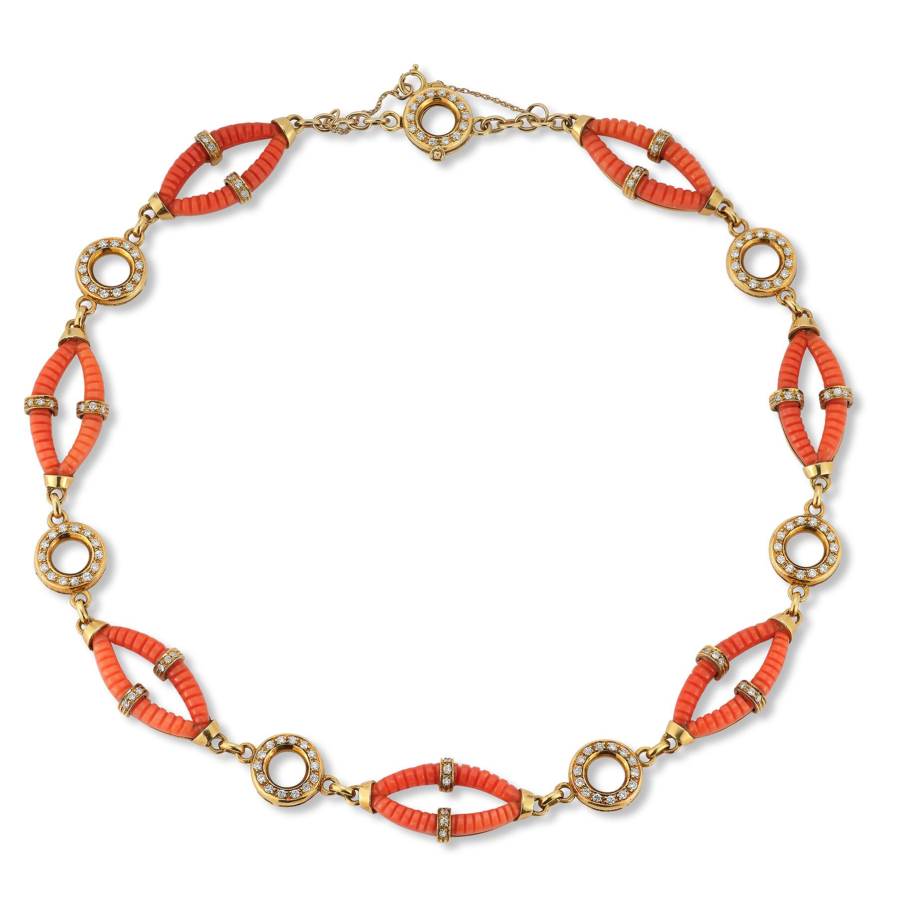 Cartier Coral & Diamond Necklace

Carved coral & round diamond link necklace

Measurements: 16