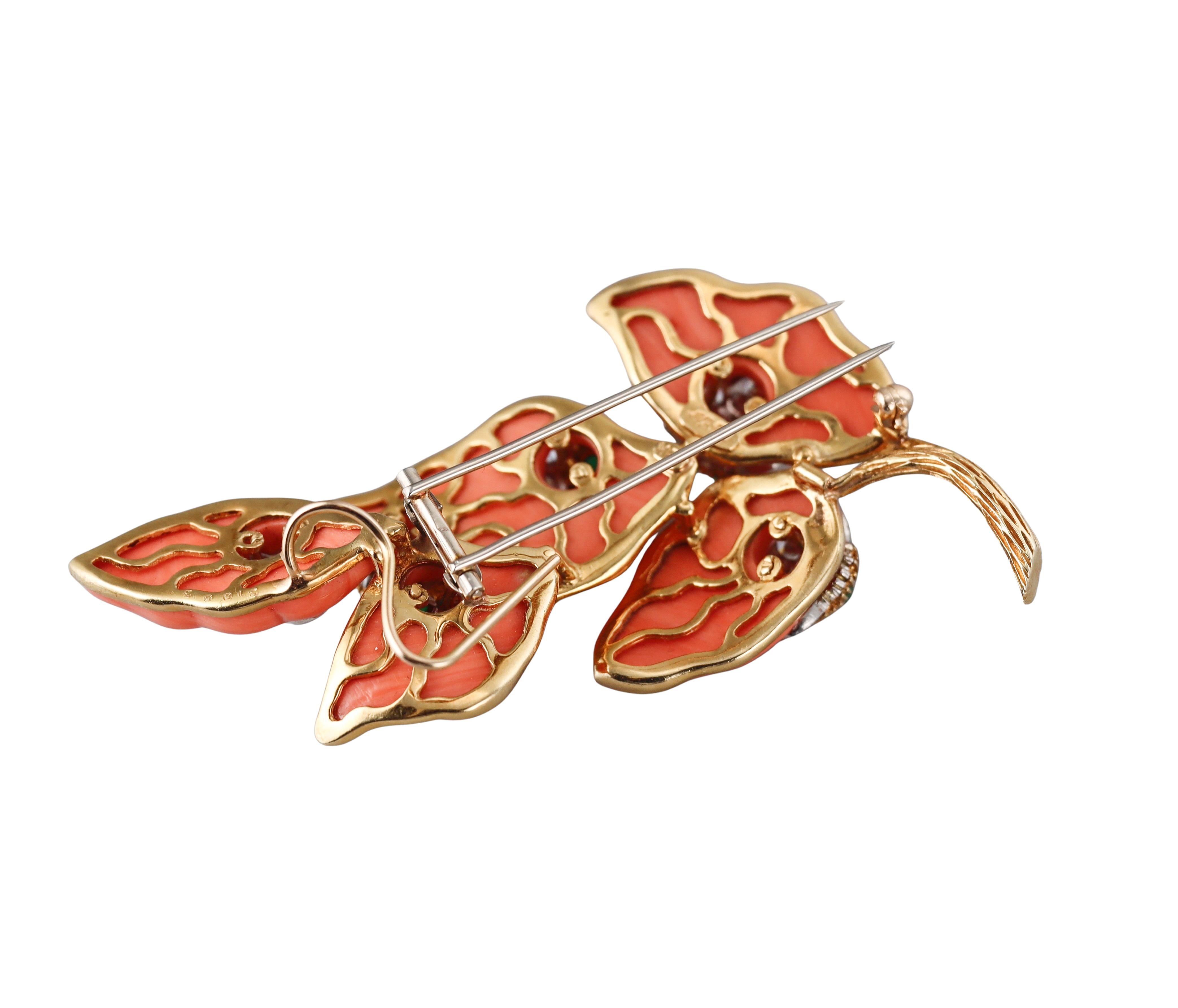 18k yellow gold Cartier brooch, set with coral, emeralds and approx. 3.00ctw G/VS diamonds. Brooch measures 3