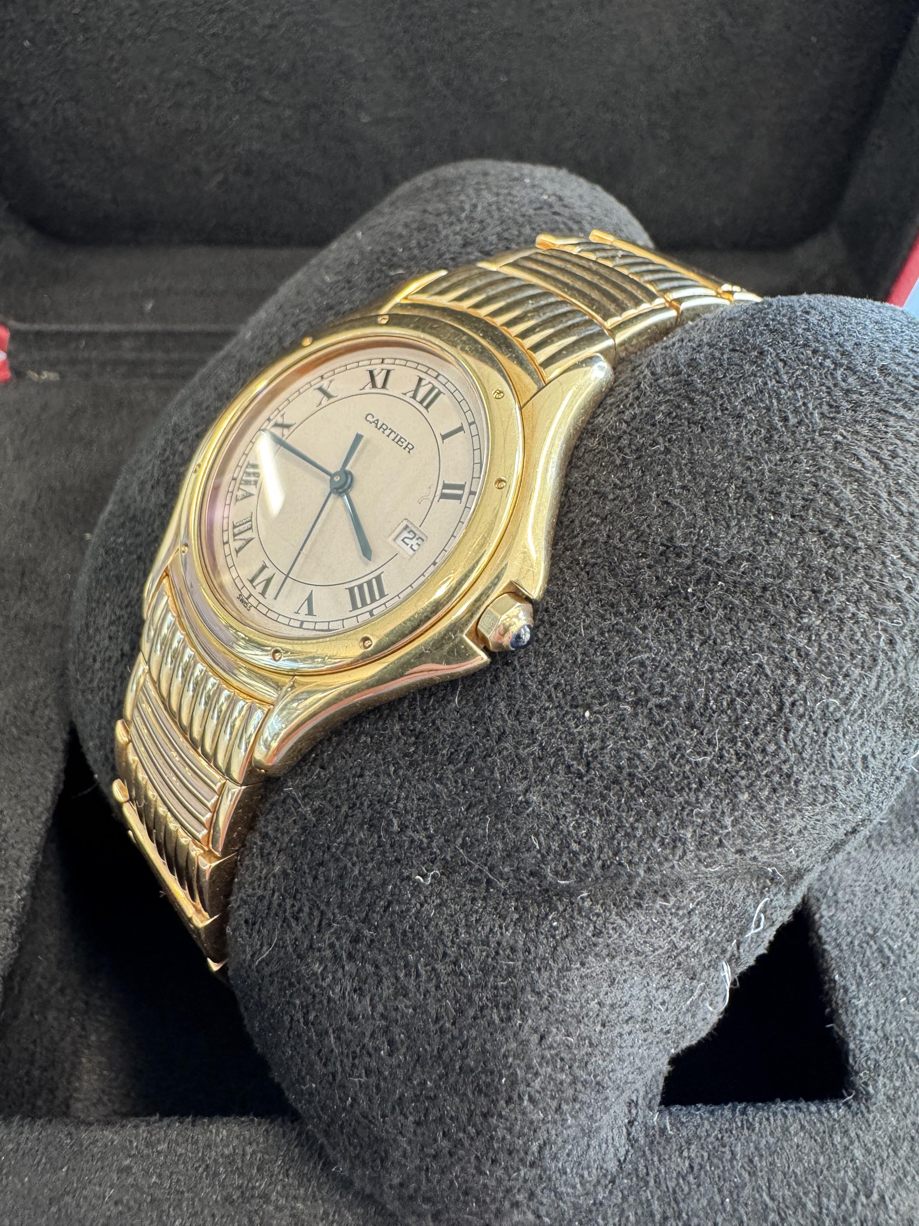 BRAND: Cartier
MODEL: Cougar
REFRENCE: 887904
SIZE: 32mm
CASE: 18k Yellow Gold
DIAL: White
BAND: 18k Yellow Gold
MOVEMENT: Quartz

Very Good condition
Rare bracelet
No box or papers

Accommodated with an up-to-date digital appraisal once purchased,