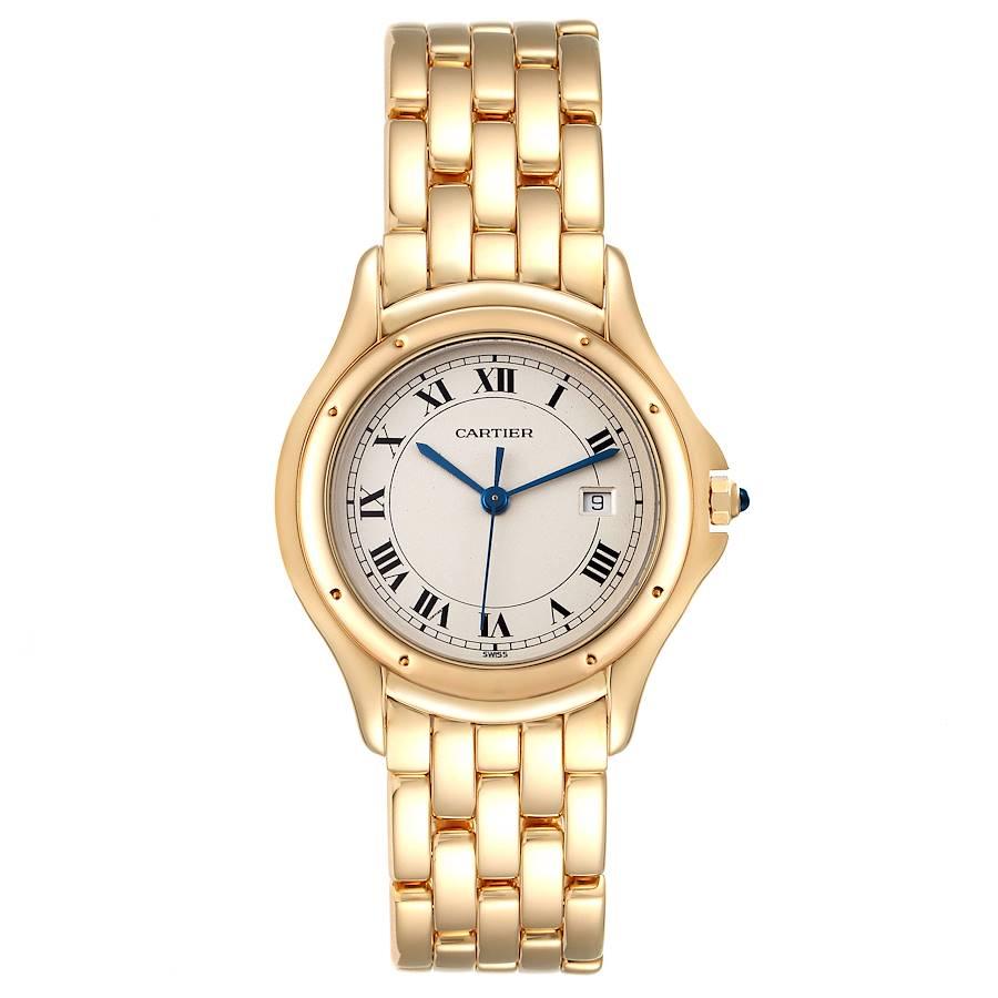 Cartier Cougar 18K Yellow Gold Silver Dial Ladies Watch 887904. Quartz movement. 18k yellow gold round case 32 mm in diameter Octagonal crown set with the blue sapphire cabochon. . Scratch resistant sapphire crystal. Silver dial with roman numerals.