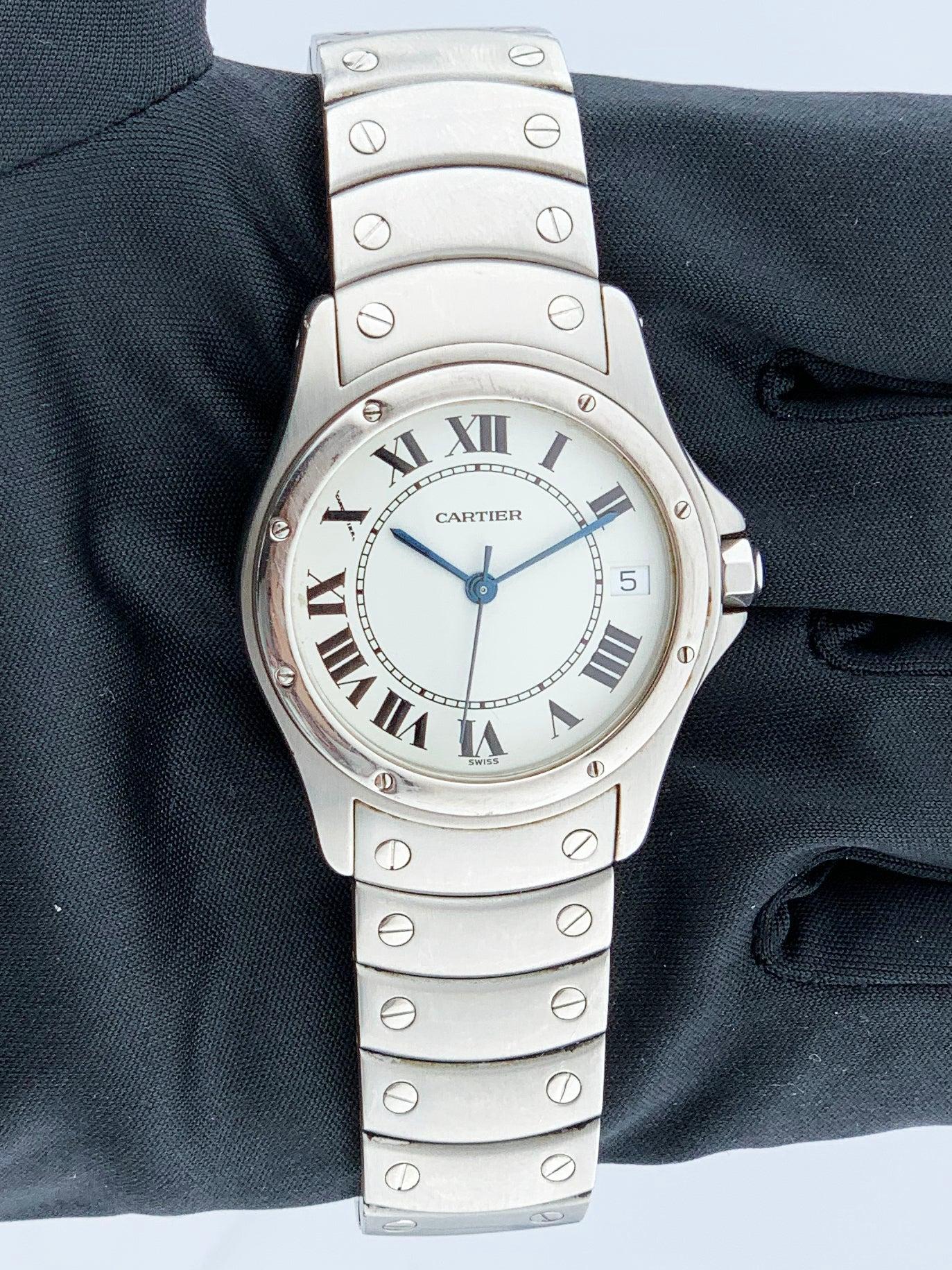 Cartier Cougar 1920/1 Mens Watch. 33mm Stainless steel case with stainless steel smooth bezel. White dial with Blue steel hands and Roman numeral hour markers.Minute markers on the inner dial. Date display at 3 o'clock position. Stainless
