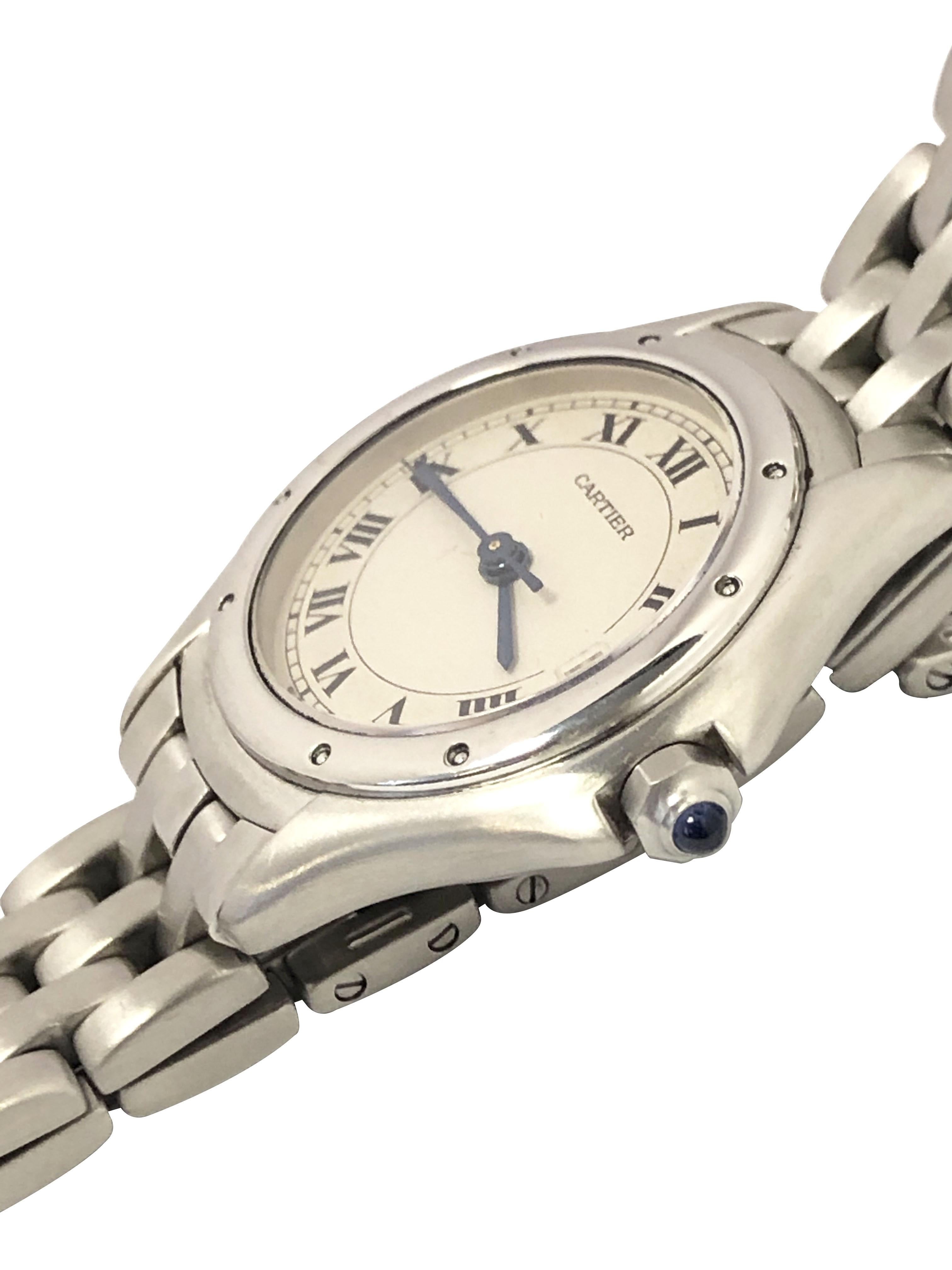 Circa 1990s Cartier Classic Ladies Cougar Wrist watch, 26 MM Stainless Steel case, quartz Movement, White Dial with Black roman Numerals, sweep seconds hand, Calendar window at the 3 position and a sapphire Crown. 1/2 inch wide Stainless Steel link