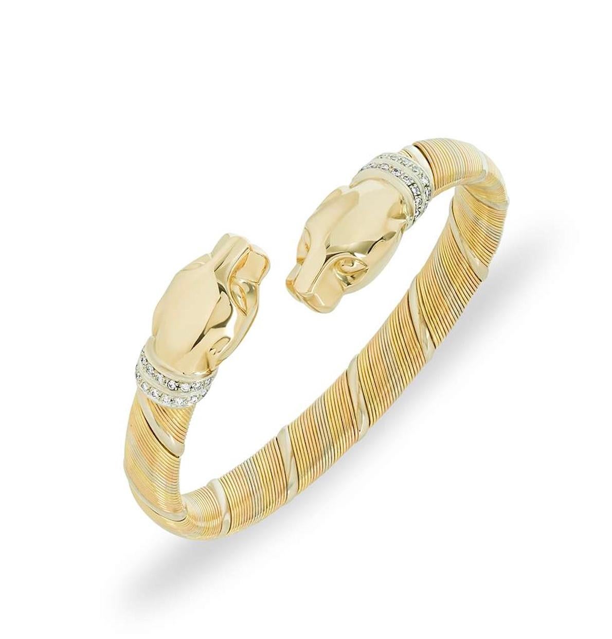 Cartier Cougar Panther Diamond Gold Bracelet.
Signed Cartier, numbered and marked.