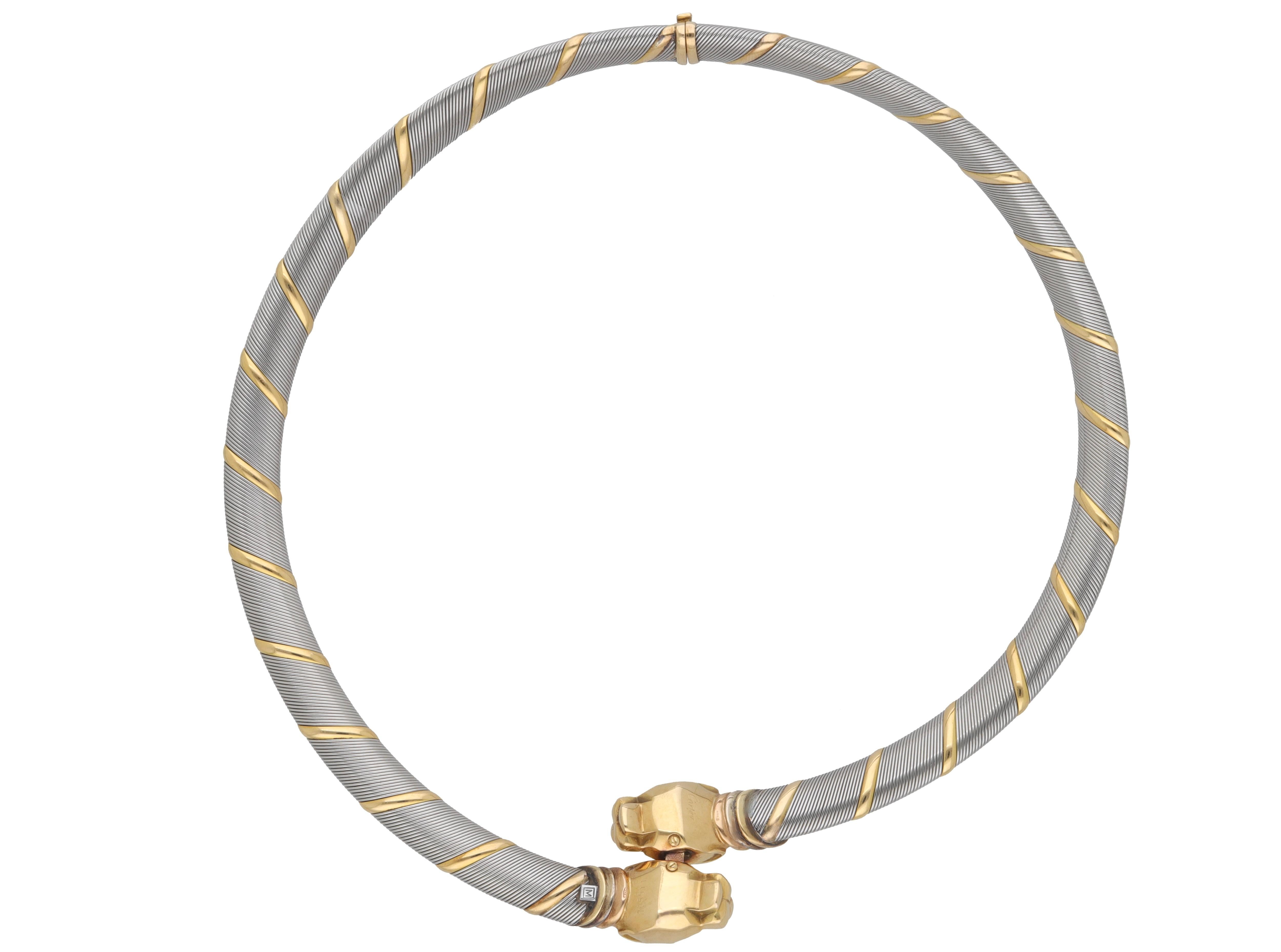 Collier en or jaune 18 carats et acier signé Cartier.
Ce magnifique collier fait partie de la collection Cougar Panthere de Cartier.
La partie centrale du collier représente deux têtes de panthère entrelacées.
L'encolure peut être ouverte au moyen