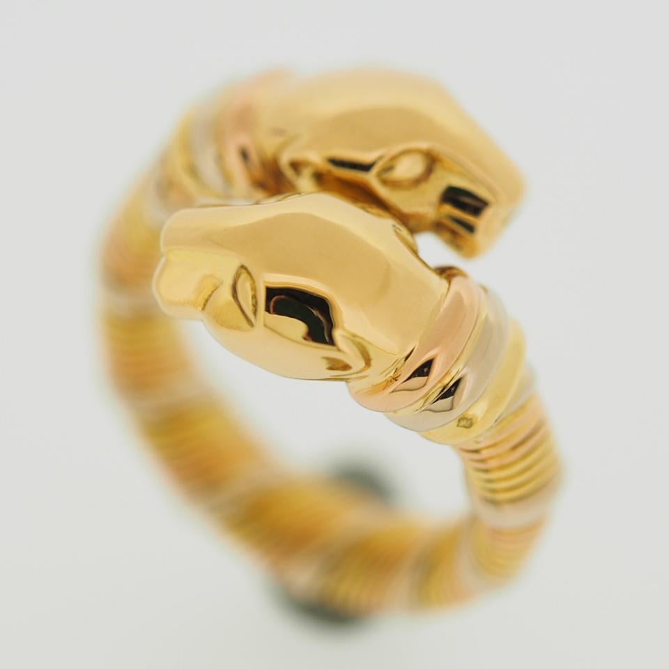 Item: Cartier Cougar Panther Ring
Stones: ---
Metal: 18K Yellow / Rose / White Gold
Ring Size: 51 US SIZE 5.5 UK SIZE K1/4
Internal Diameter: 16.15 mm
Measurements: 5.0 - 14.3 mm
Weight: 11.9 Grams
Condition: Used (repolished)
Retail Price: