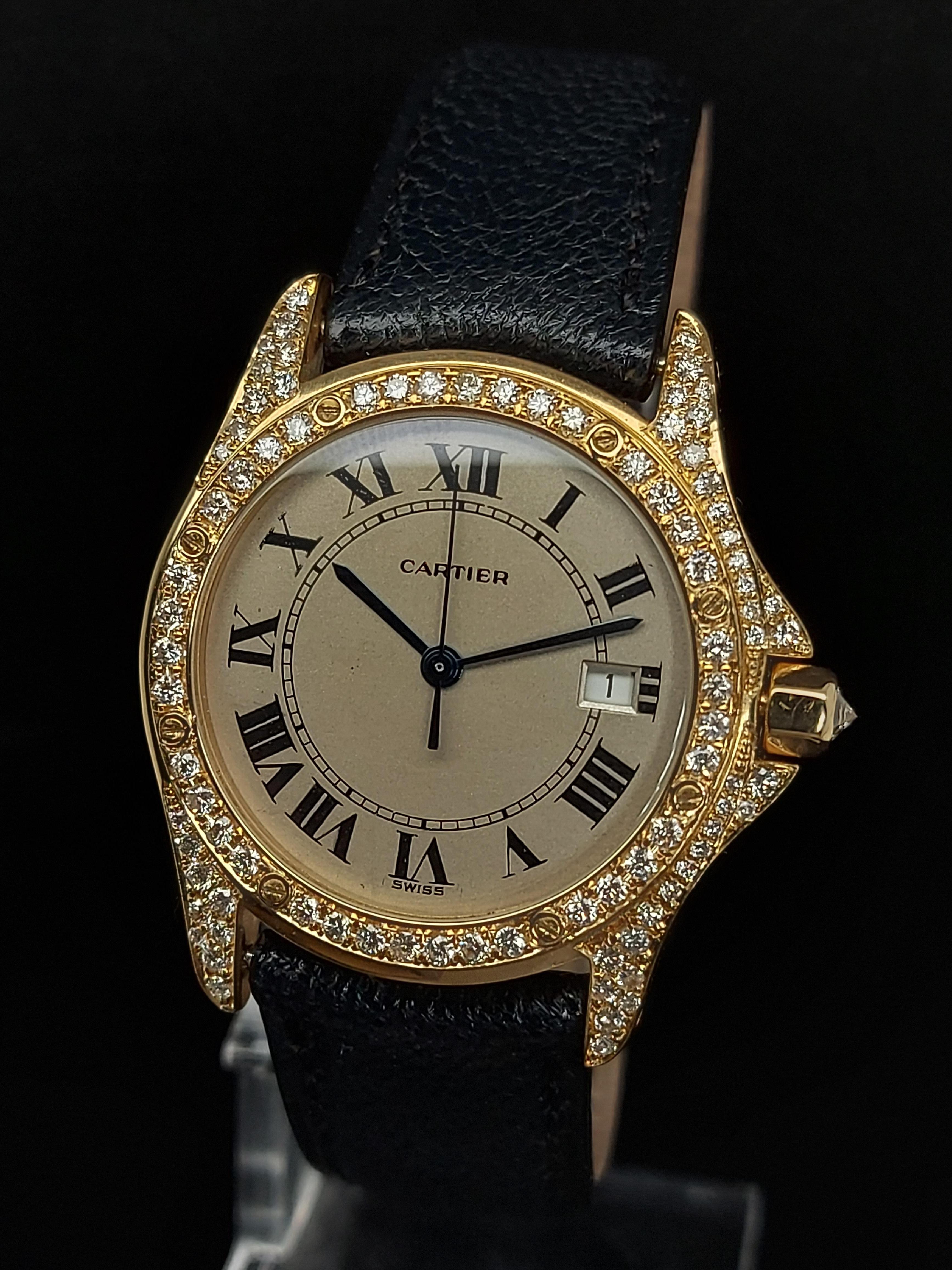 Cartier Cougar Wrist Watch, 18 kt Yellow Gold 30 mm, Diamond Bezel, Quartz

Movement: Quartz

Functions: Hours, Minutes, Seconds, Date window at 3 o'clock

Case: 18 kt yellow gold case, Diameter 30 mm, Thickness 6.8 mm, Diamond set bezel, Water