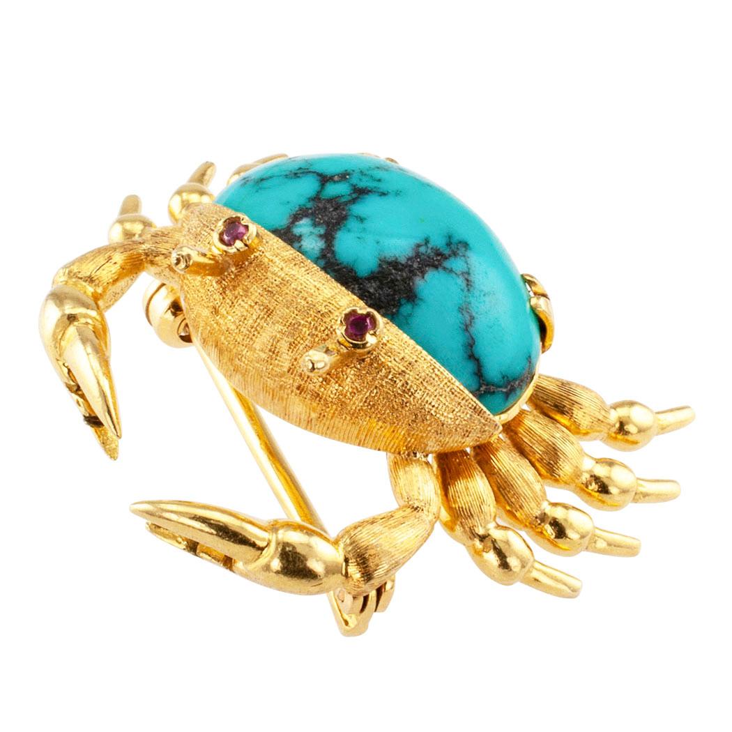 Cartier turquoise ruby and gold crab brooch circa 1960. A very cute little crab with its turquoise shell and ruby-set eyes, embodying the essence of crab posture to perfection, regardless of the angle from which you look at it. Crafted in 18-karat