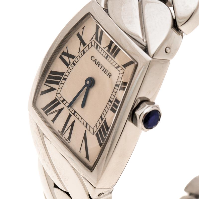 This Cartier creation is a fitting example of fine watch artistry and assembly! Functioning in a Quartz movement, this timepiece comes in a stainless steel body with a link bracelet. The sapphire glass protects the cream dial bearing Roman numeral