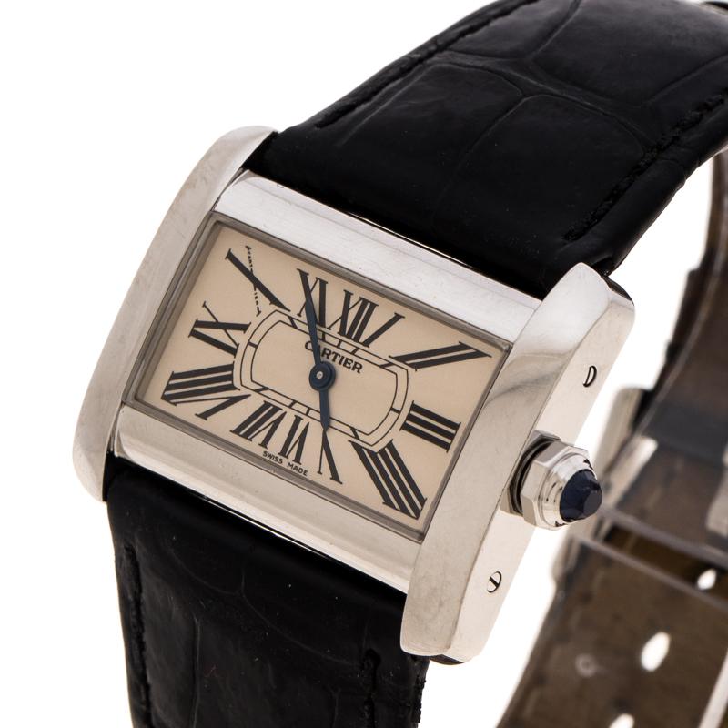 For the lovers of the minimalist fashion comes this stately Tank Divan watch from Cartier. It has a stainless steel case of 31 mm diameter and enclosed within it is a small square, cream-coloured dial, that features Roman numeral hour markers and