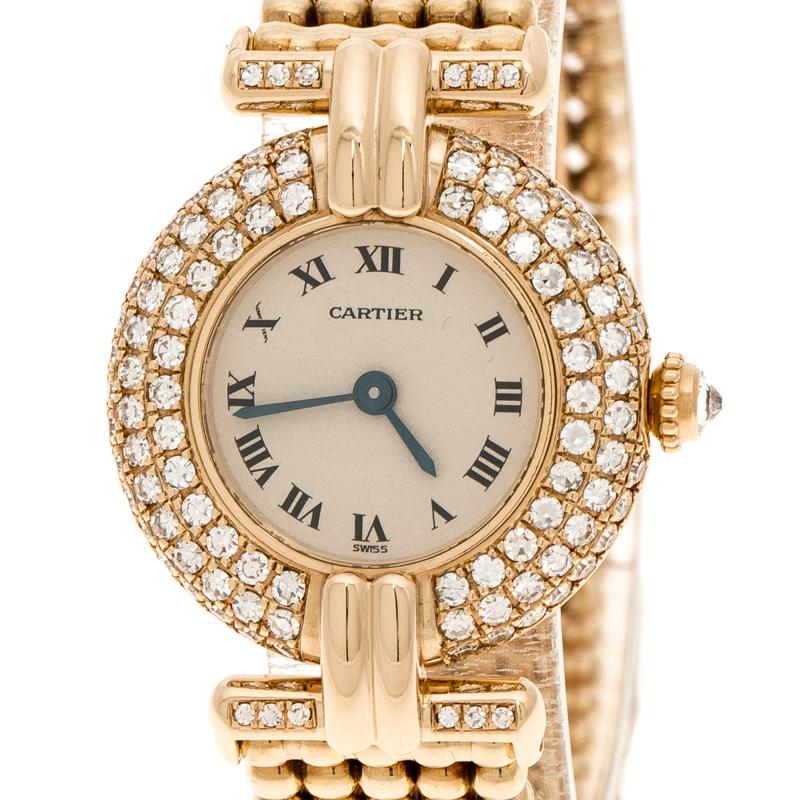 Designed with a blissful blend of luxury and fine craftsmanship, this Diamond Colisee from Cartier is sure to delight your style. In an 18k yellow gold body, the watch functions in a quartz movement. A sapphire crystal glass protects a cream dial