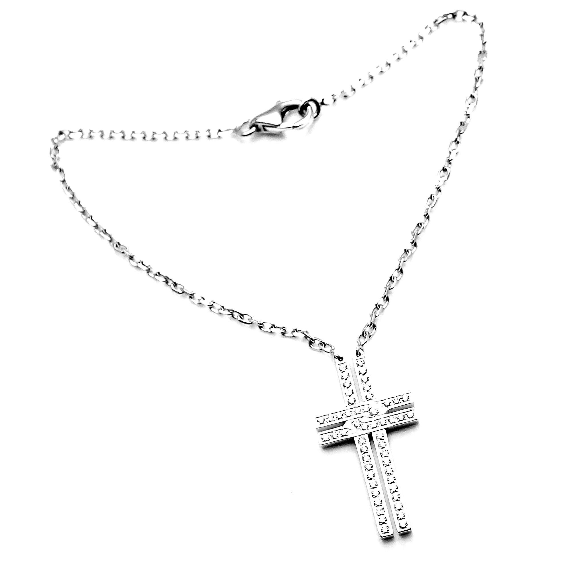 18k White Gold Diamond Cross Charm Link Bracelet by Cartier.
With 52 round brilliant cut diamonds VVS1 clarity, E color total weight approx. .26ctw
This bracelet comes with Cartier certificate.
Details:
Length: 7