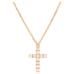 Cartier Halskette mit Kreuzanhänger aus 18 Karat Roségold mit Diamanten