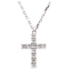 Cartier, collier pendentif croix en or blanc 18 carats et diamants