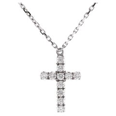 Cartier, collier pendentif croix en or blanc 18 carats et diamants