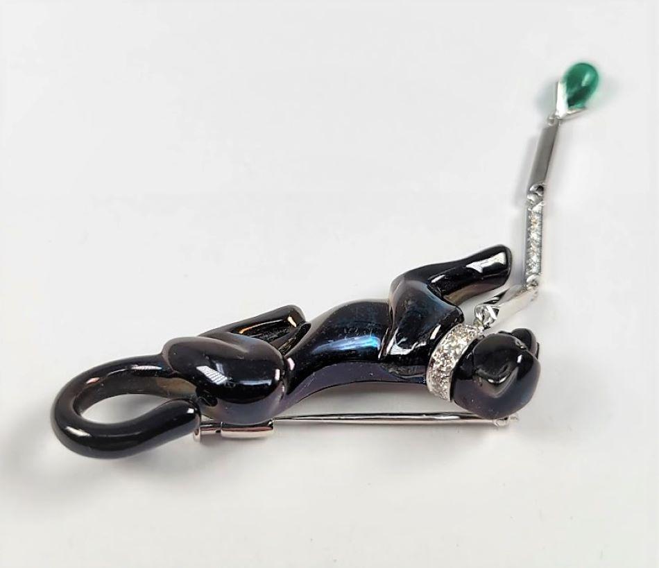 This classic and timeless platinum brooch with black finish panthere, diamond and gemset collar and leash is simply stunning.  Your chance to own an iconic, retired item by Cartier.  