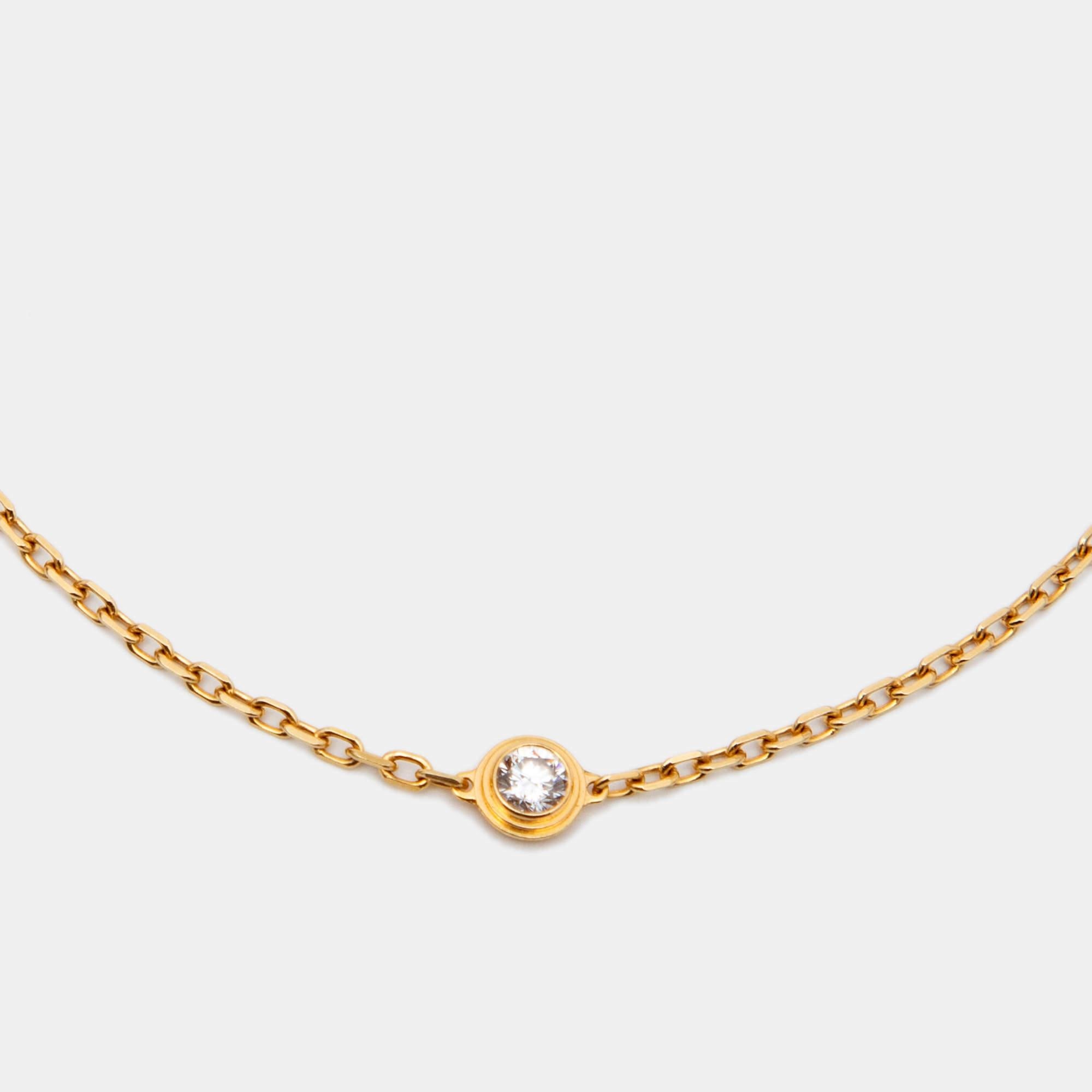 Cartier d'Amour collection has pieces designed with wearability in mind to act as everyday symbols of love. From that exclusive line comes this bracelet fashioned in 18k yellow gold. The delicate chain is secured by a lobster clasp and highlighted