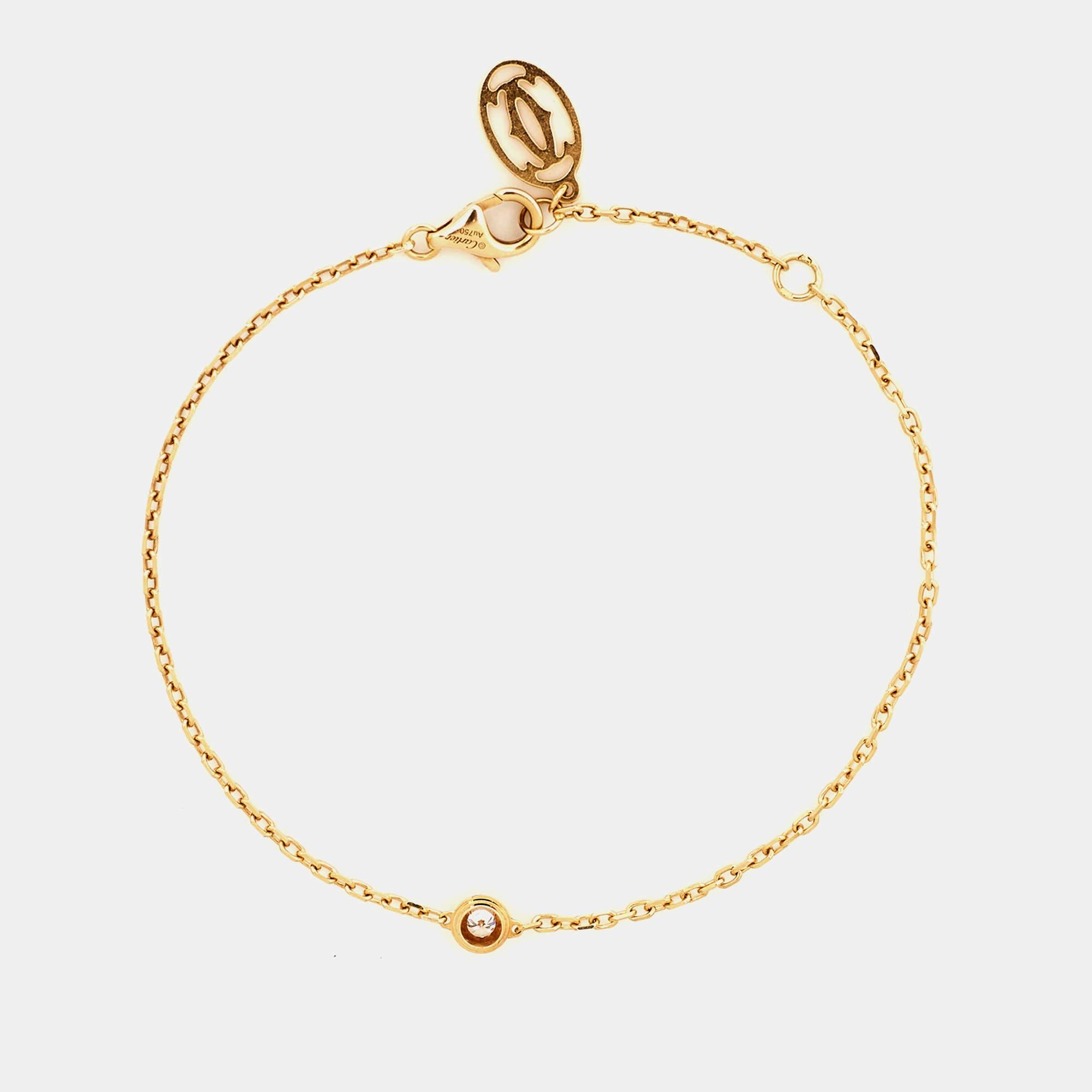 Cartier d'Amour collection has pieces designed with wearability in mind to act as everyday symbols of love. From that exclusive line comes this bracelet fashioned in 18k yellow gold. The delicate chain is secured by a lobster clasp and highlighted