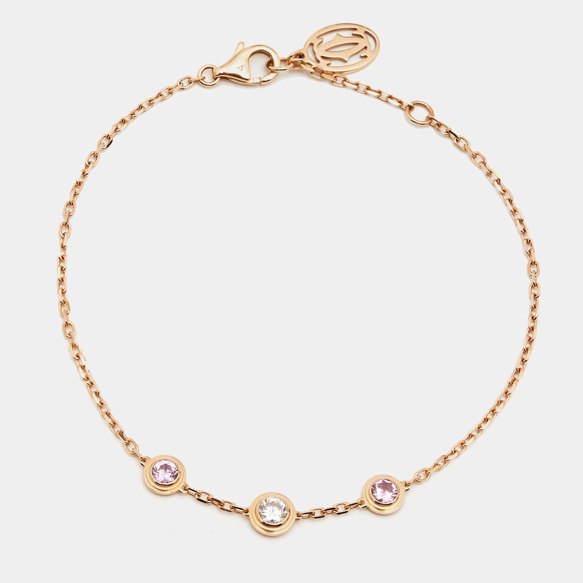 Cartier d'Amour collection has pieces designed with wearability in mind to act as everyday symbols of love. From that exclusive line comes this necklace fashioned in 18k rose gold. The delicate chain is secured by a lobster clasp and highlighted by